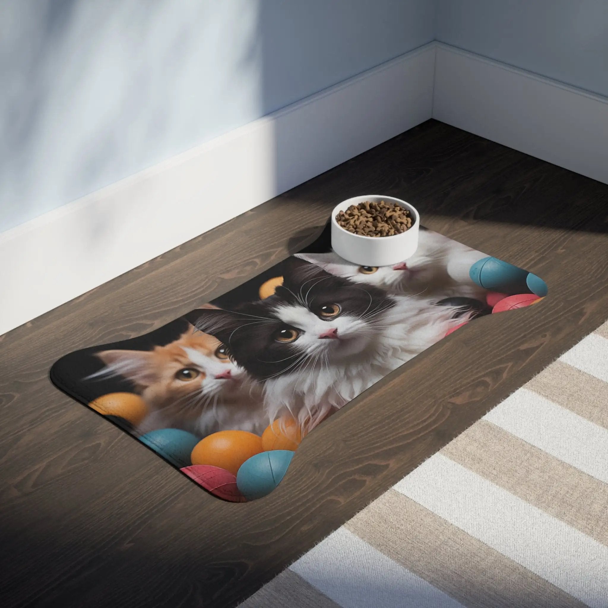 Pet Feeding Mats | a picture of two cats on a floor with a bowl of food