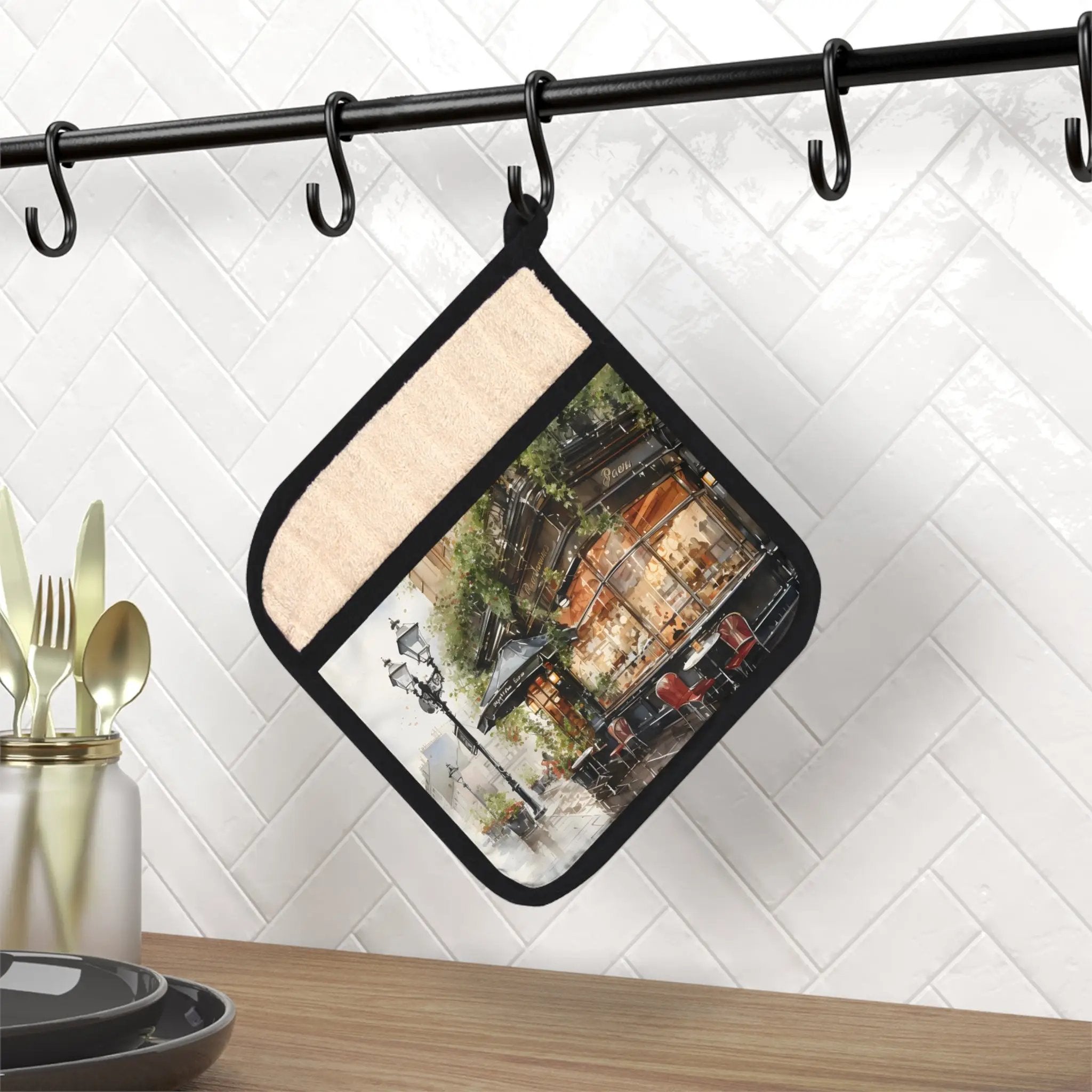 Pot Holder | a pot holder with a picture of a city on it