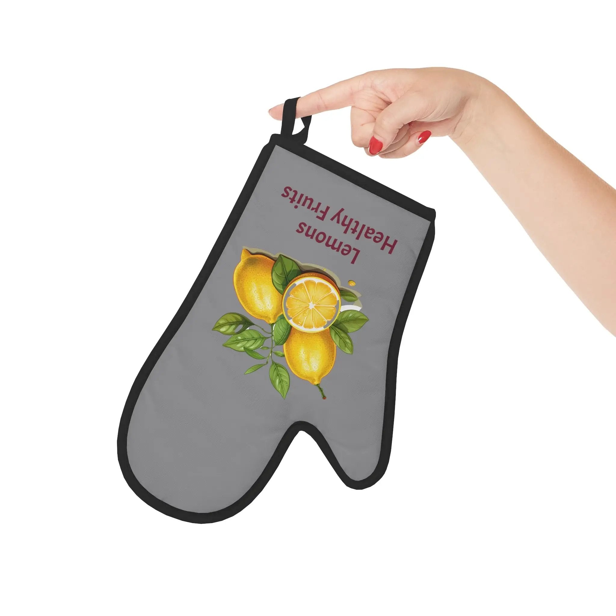 oven mitt | a hand holding a oven mitt with a picture of lemons on it