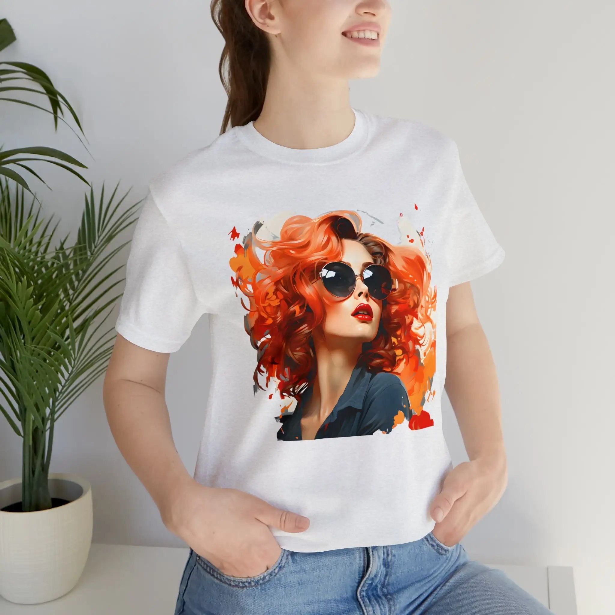 Couple t shirt | a woman wearing a t - shirt with a picture of a woman with red hair