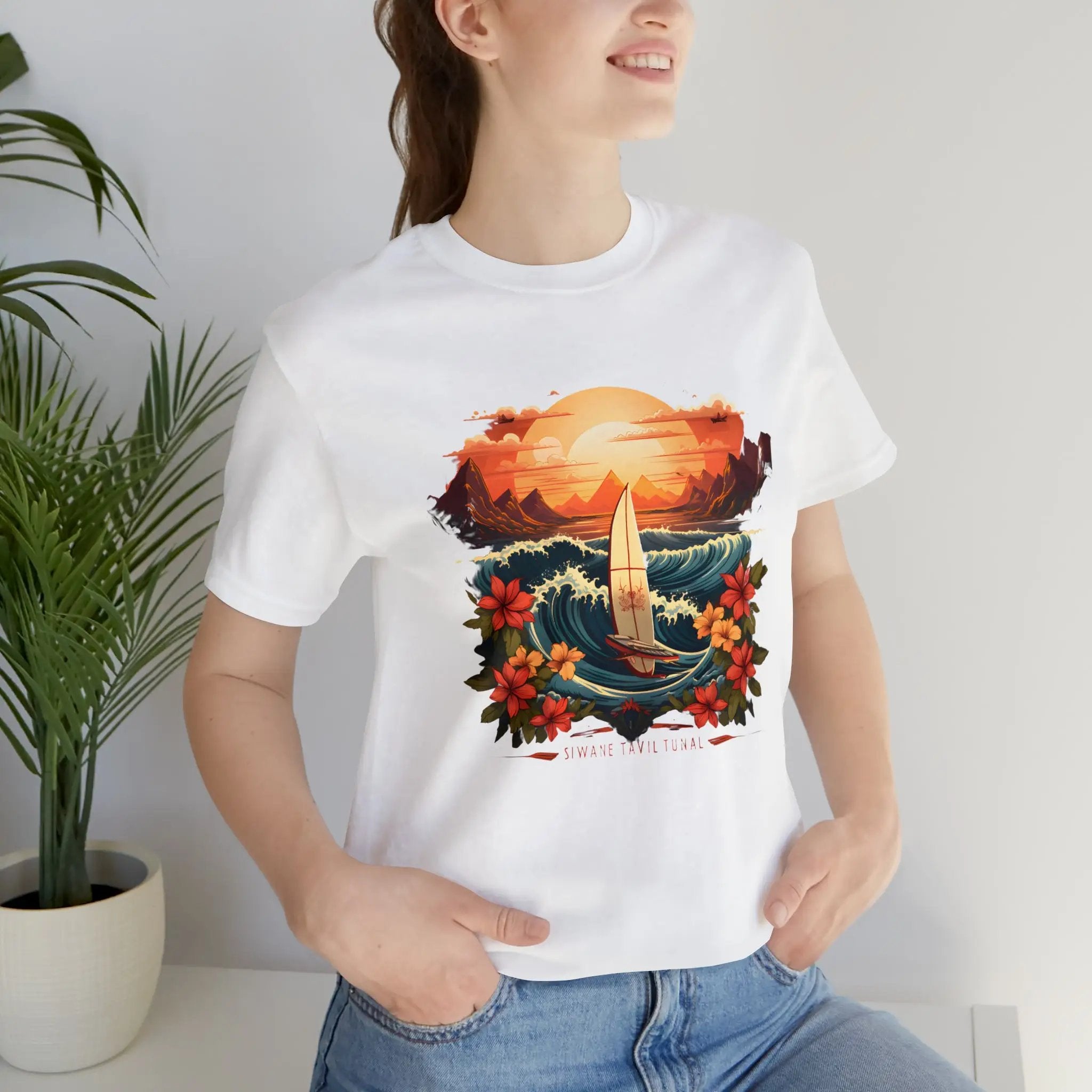 Couple t shirt | a woman wearing a white t - shirt with a picture of a sailboat on