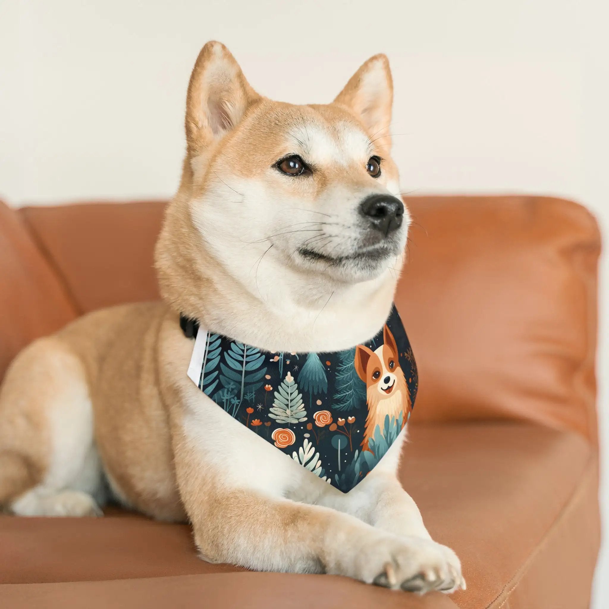 Pet Bandana | a dog sitting on a couch wearing a bandana