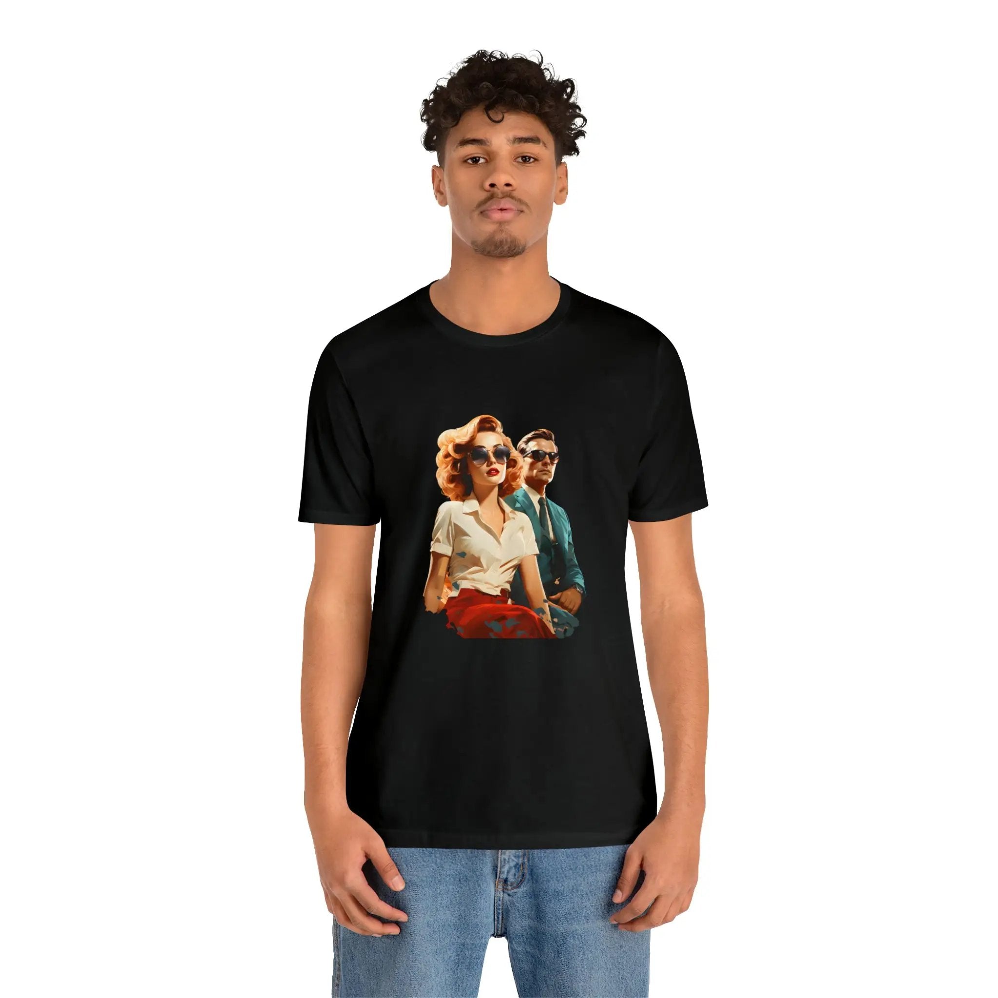 Couple t shirt | a man wearing a black t - shirt with a picture of three people on it