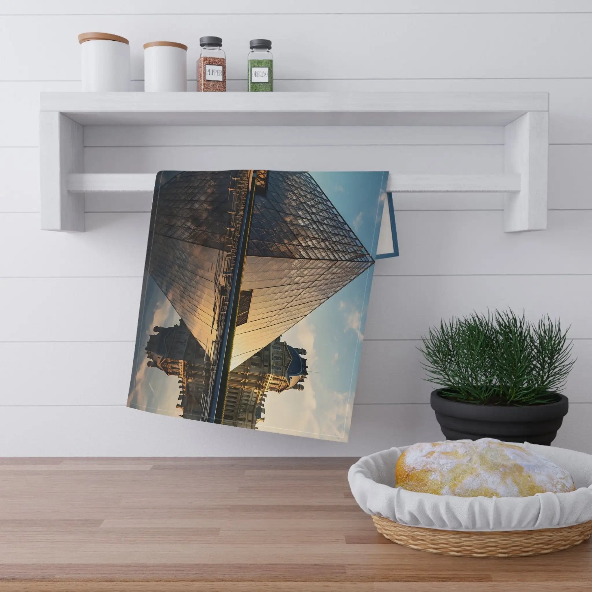 Kitchen Towel | a picture of the Louvre Pyramid hanging on a wall