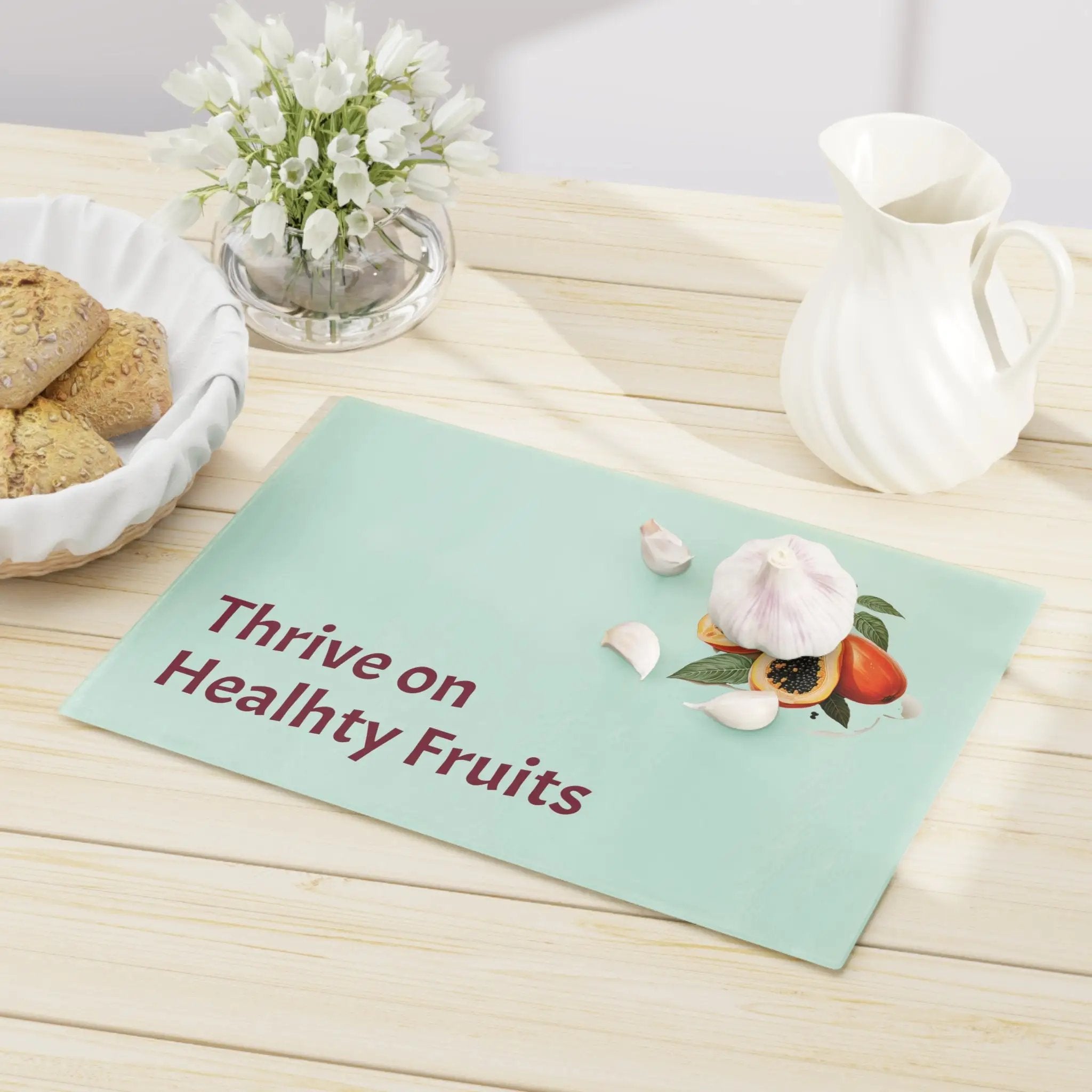 Cutting board | a table topped with a bowl of cookies and a plate of cookies