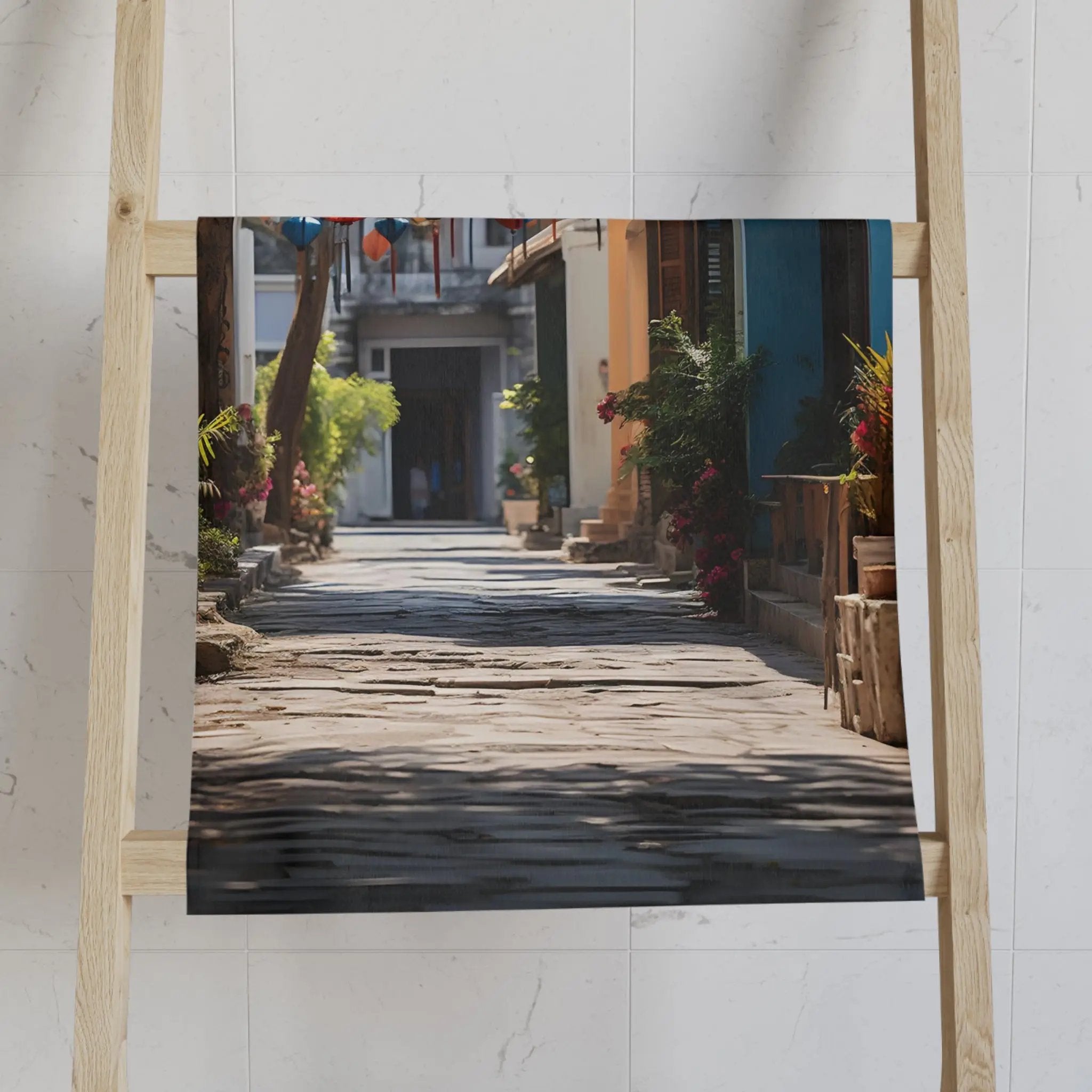 Hand towel | a picture of a narrow street with potted plants