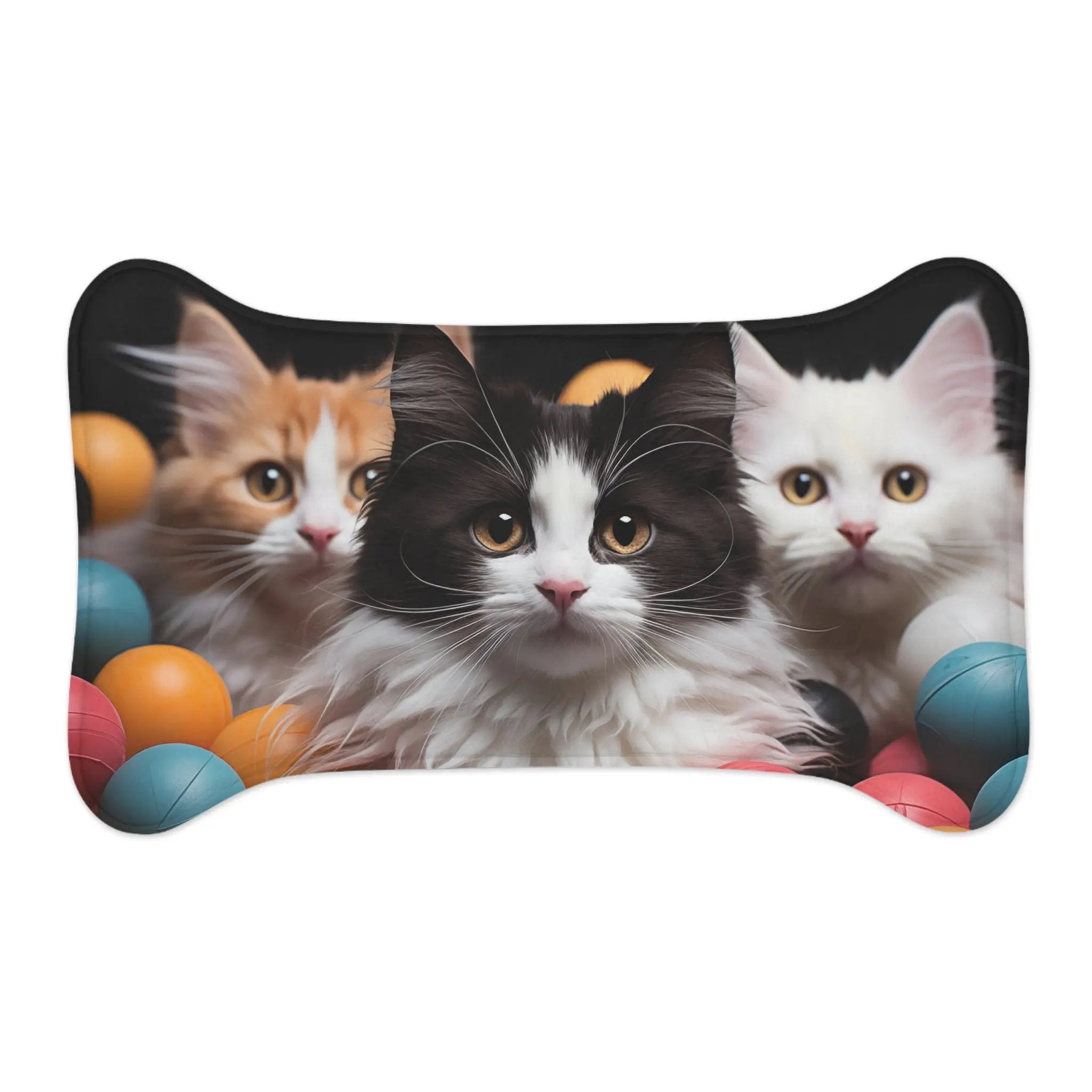 Pet Feeding Mats | a picture of three cats in a ball pit