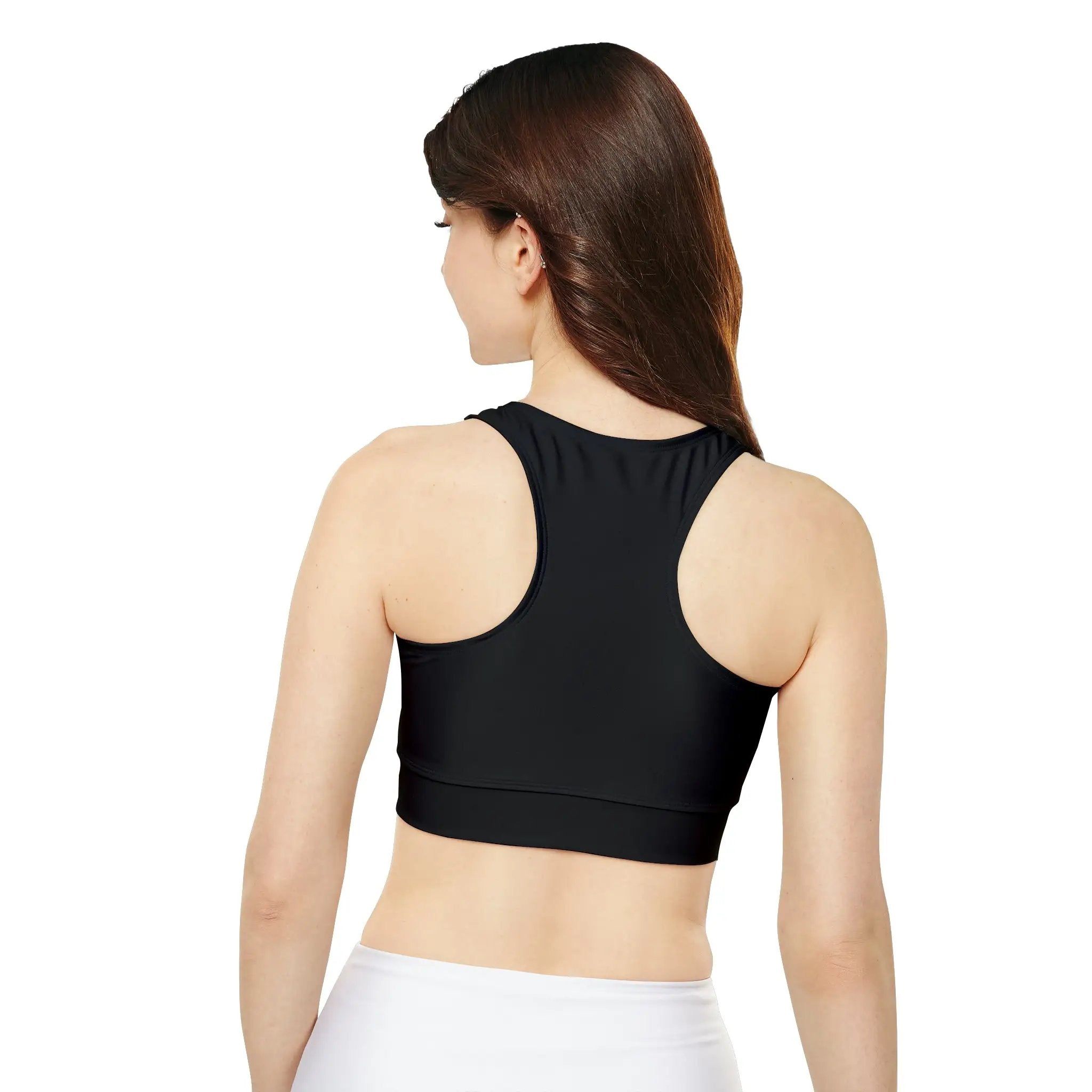 woman sports bra | a woman wearing a black sports bra top