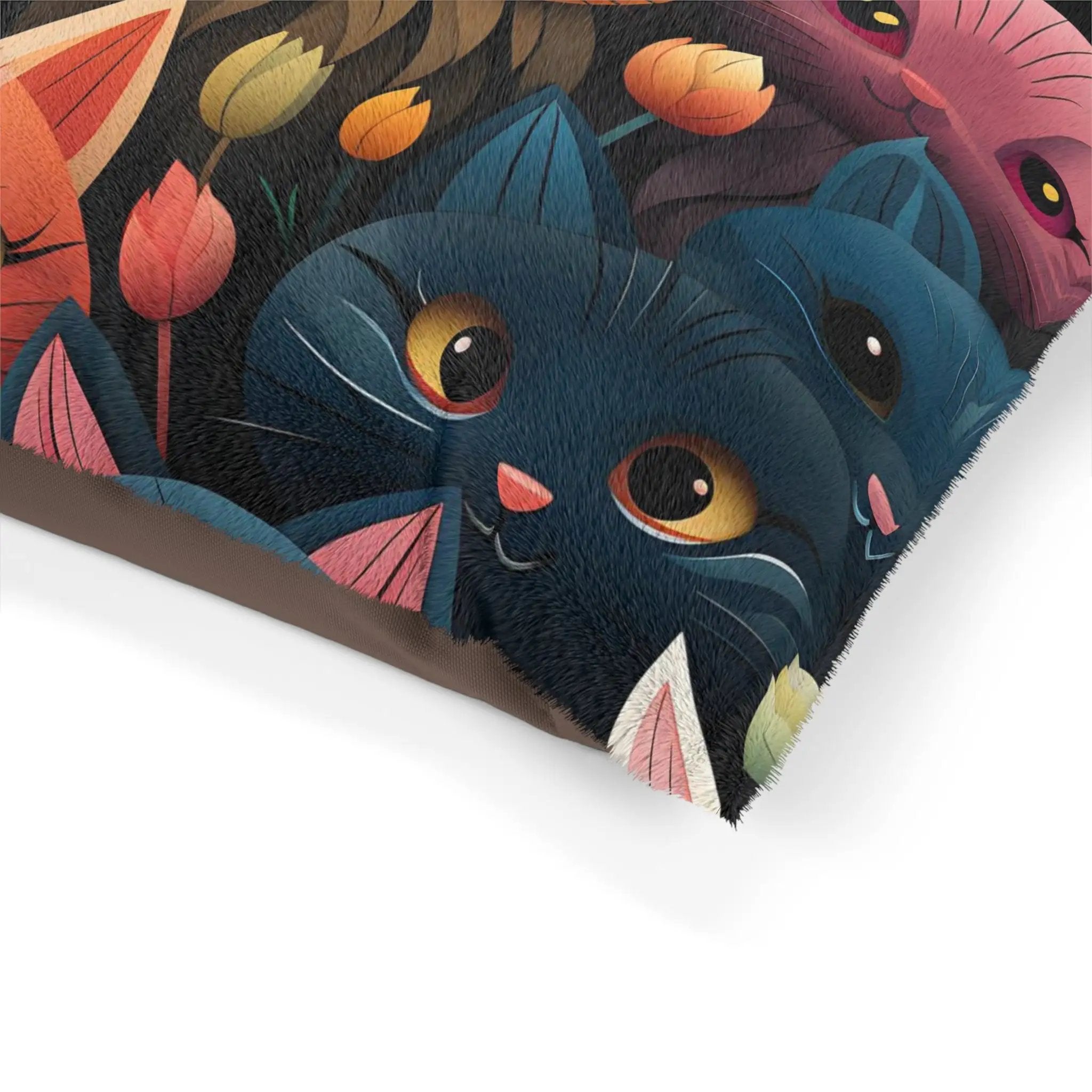 Pet bed | a close up of a pillow with cats on it