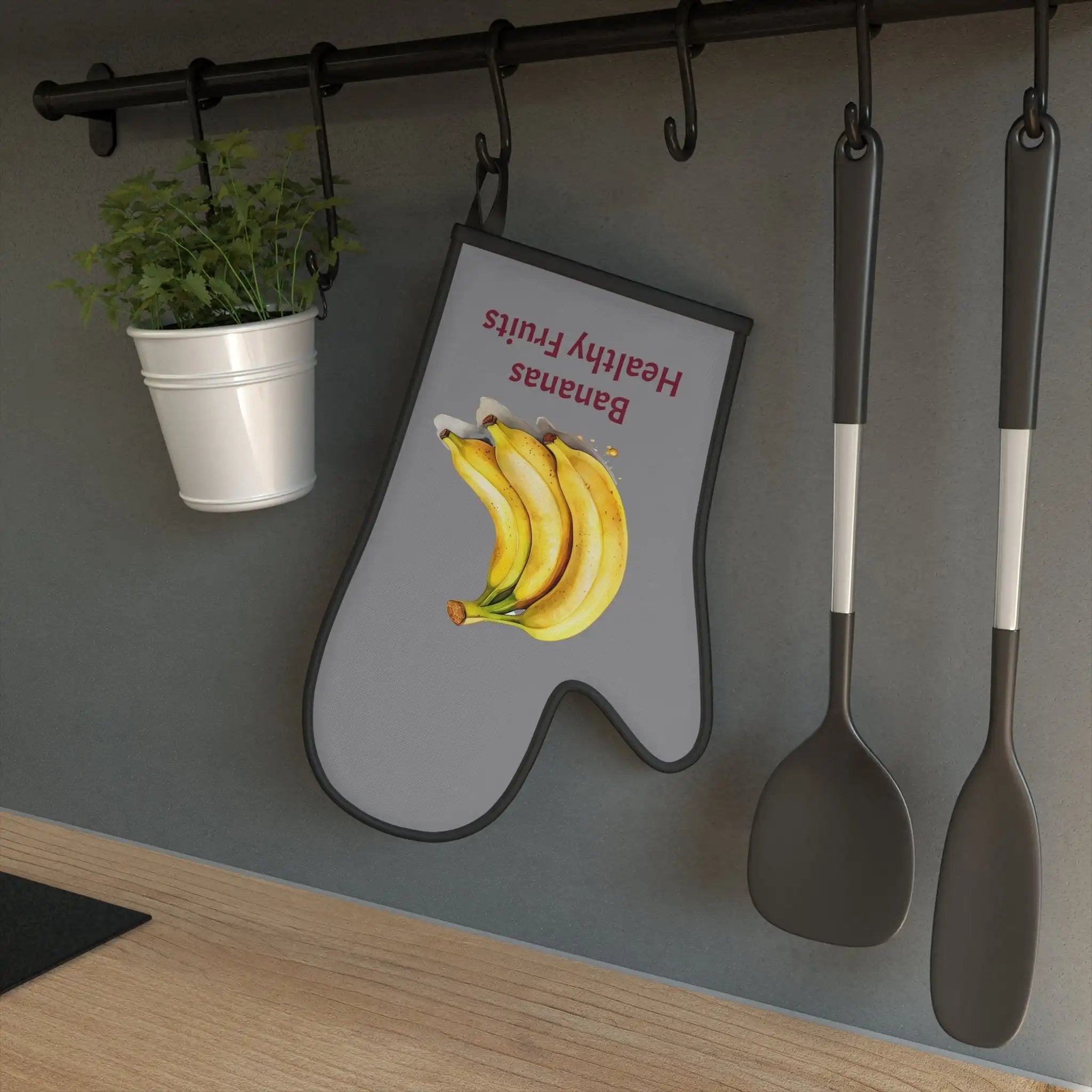 oven mitt | there is a sign with a bunch of bananas on it