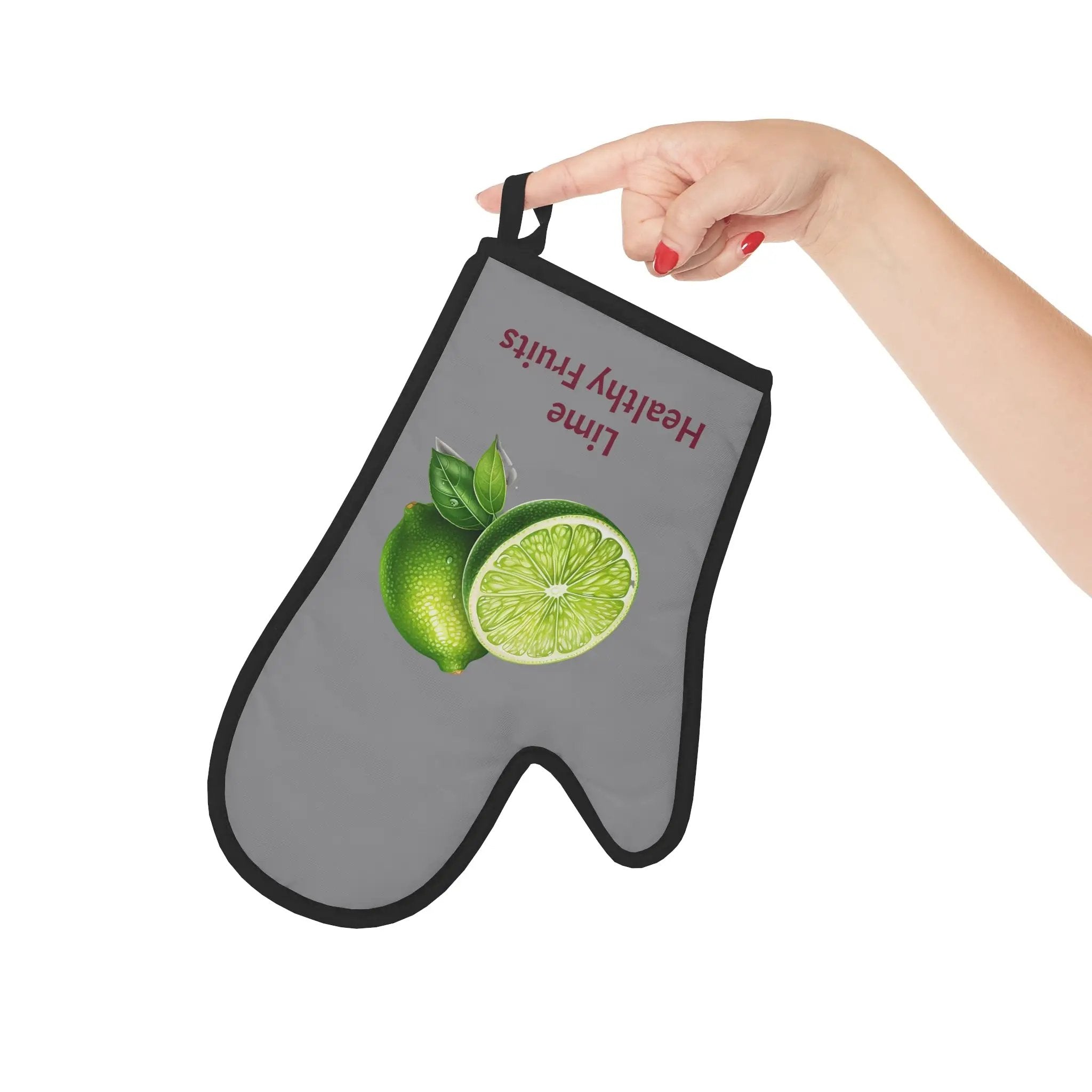 oven mitt | a person holding a lime shaped oven mitt