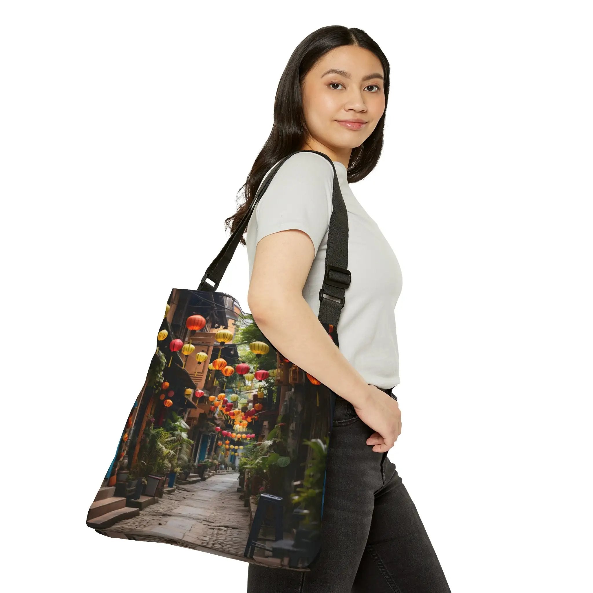 Weekender tote bag | a woman carrying a bag with a picture on it