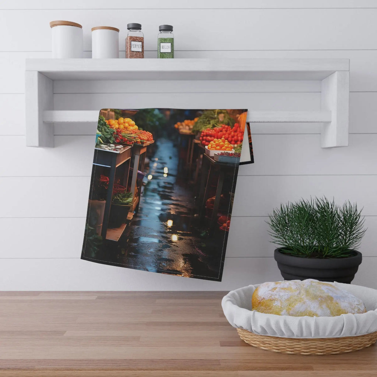 Kitchen Towel | a photo hanging on a wall next to a potted plant