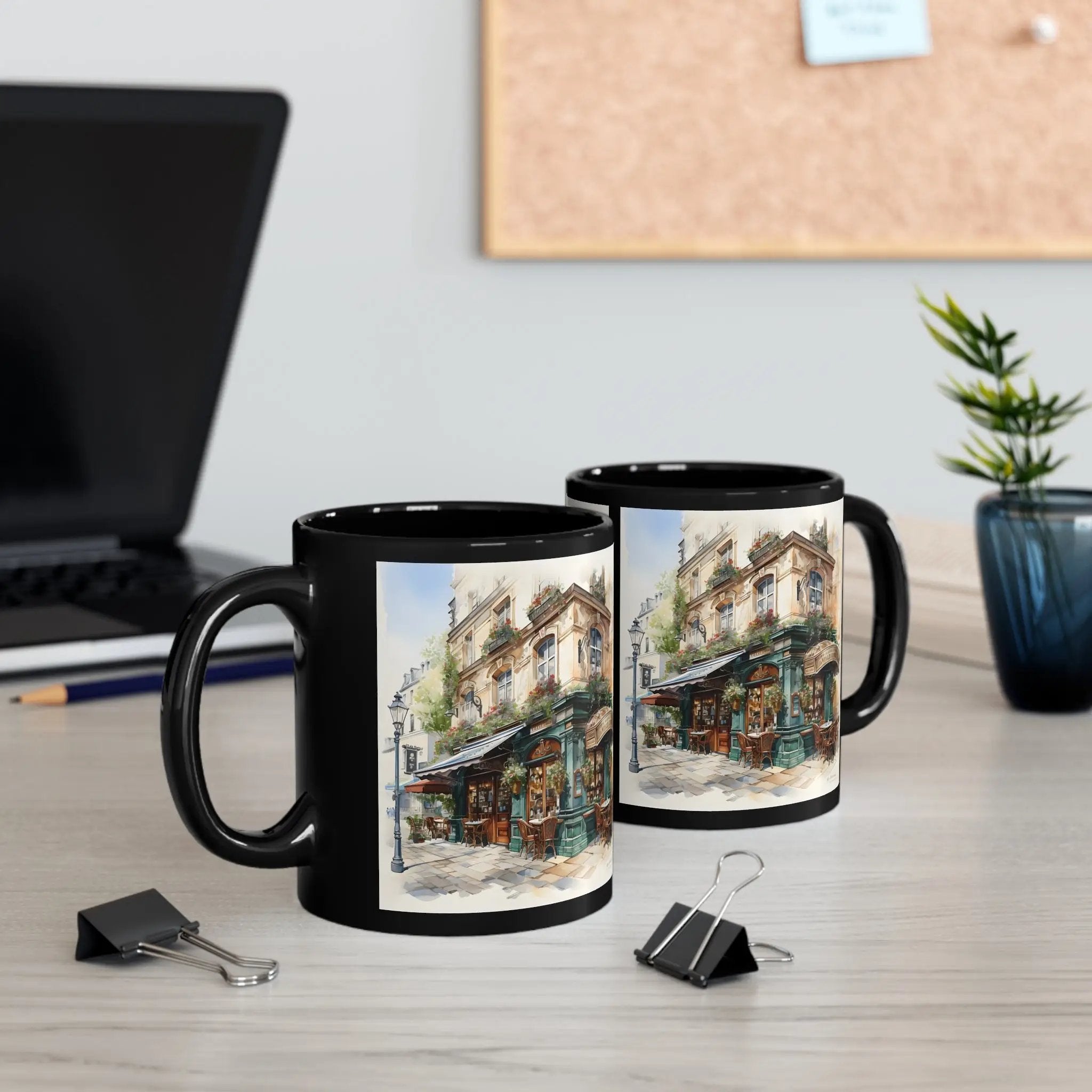 Mugs coffee | two black coffee mugs sitting on top of a table