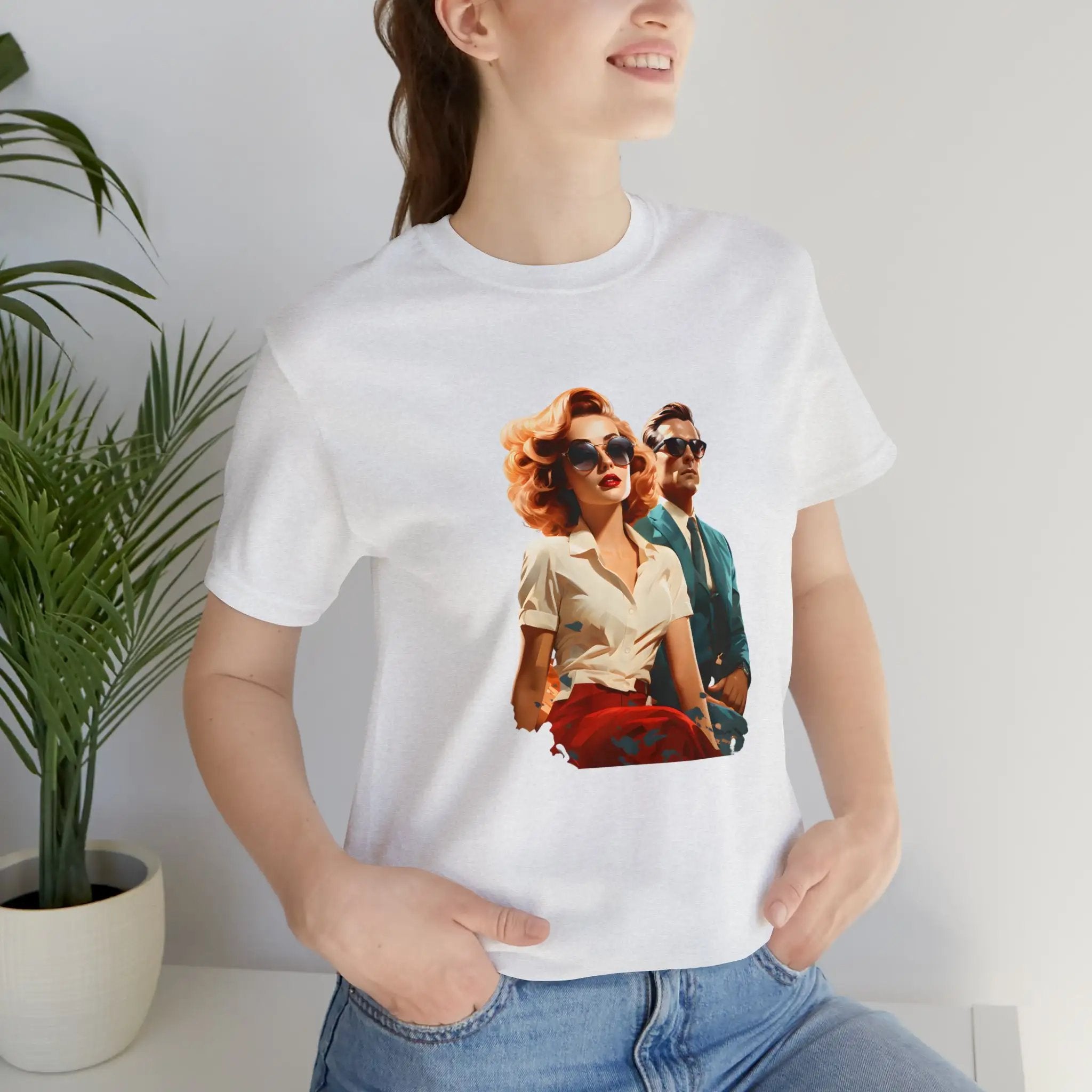 Couple t shirt | a woman wearing a t - shirt with a picture of a man and a woman