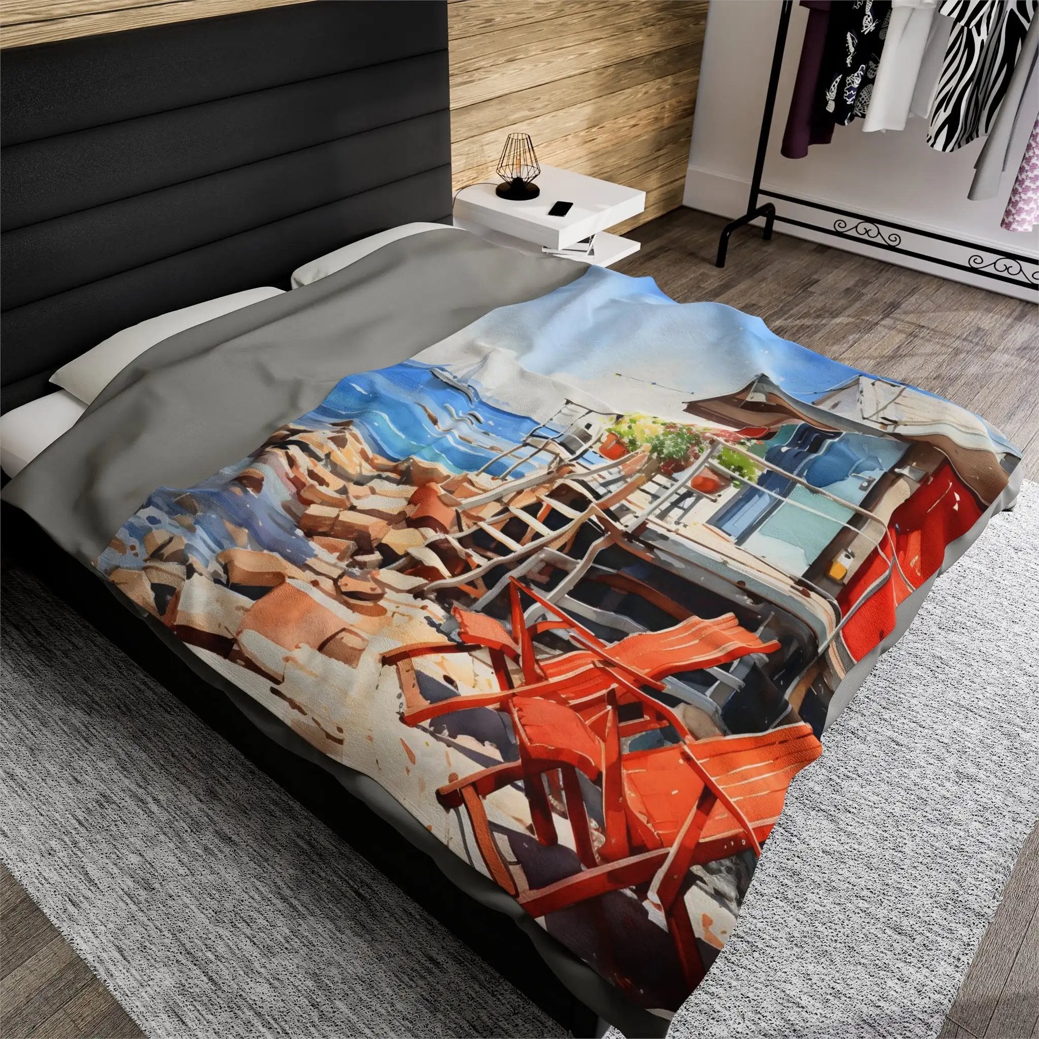 Plush Blanket | a bed with a picture of a red chair on it