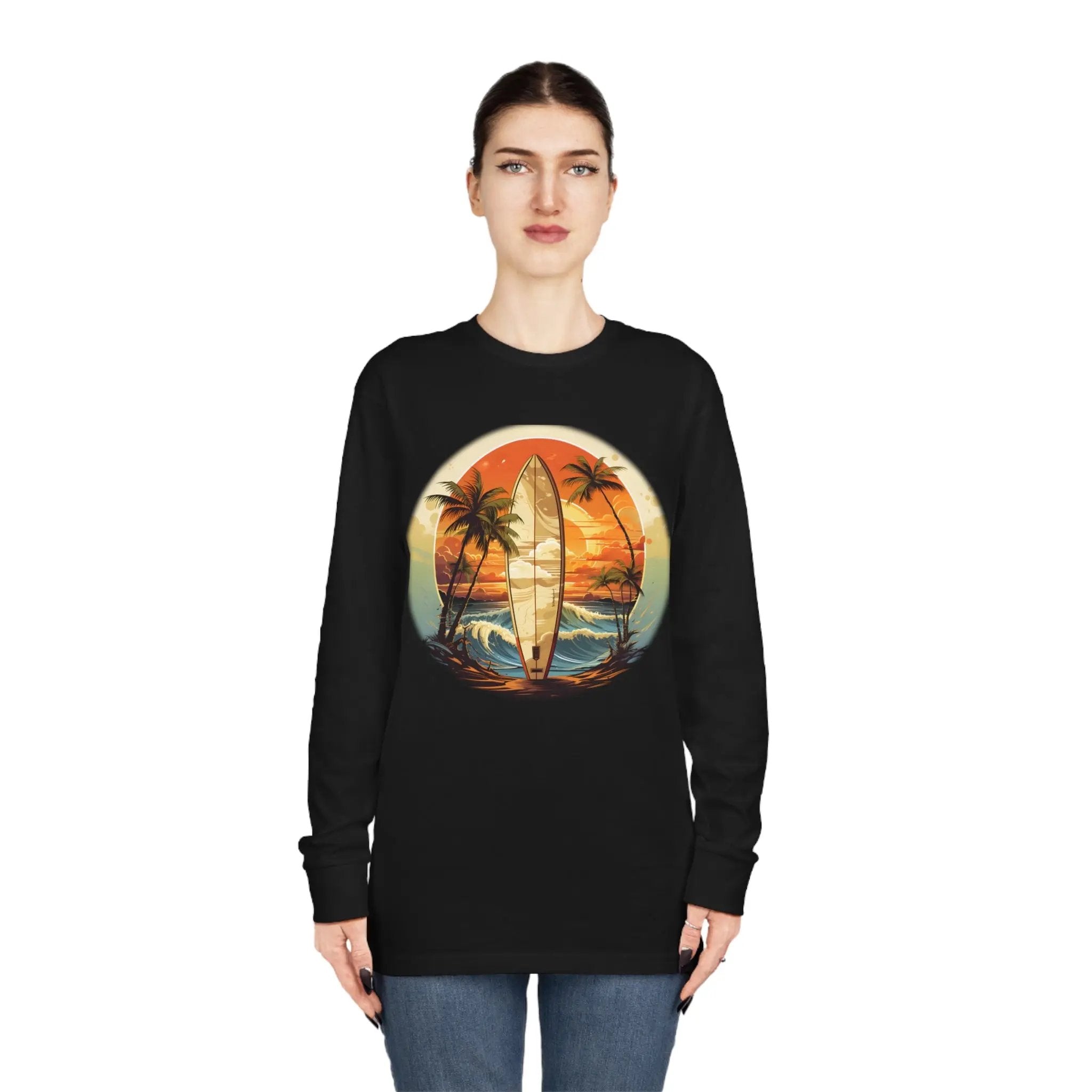 Long Sleeve t shirt | a woman wearing a black shirt with a surfboard on it