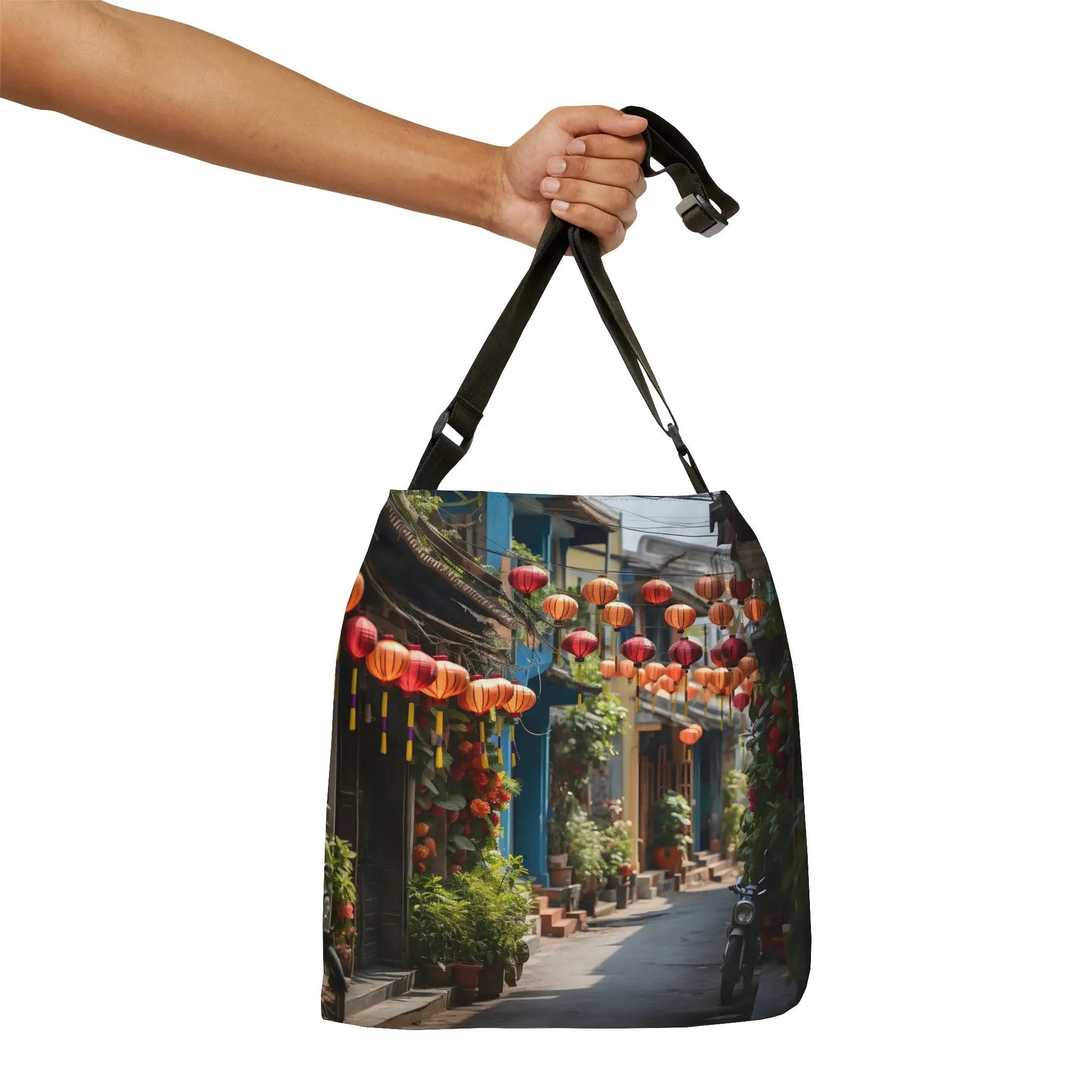 Weekender tote bag | a hand holding a bag with a picture of a street