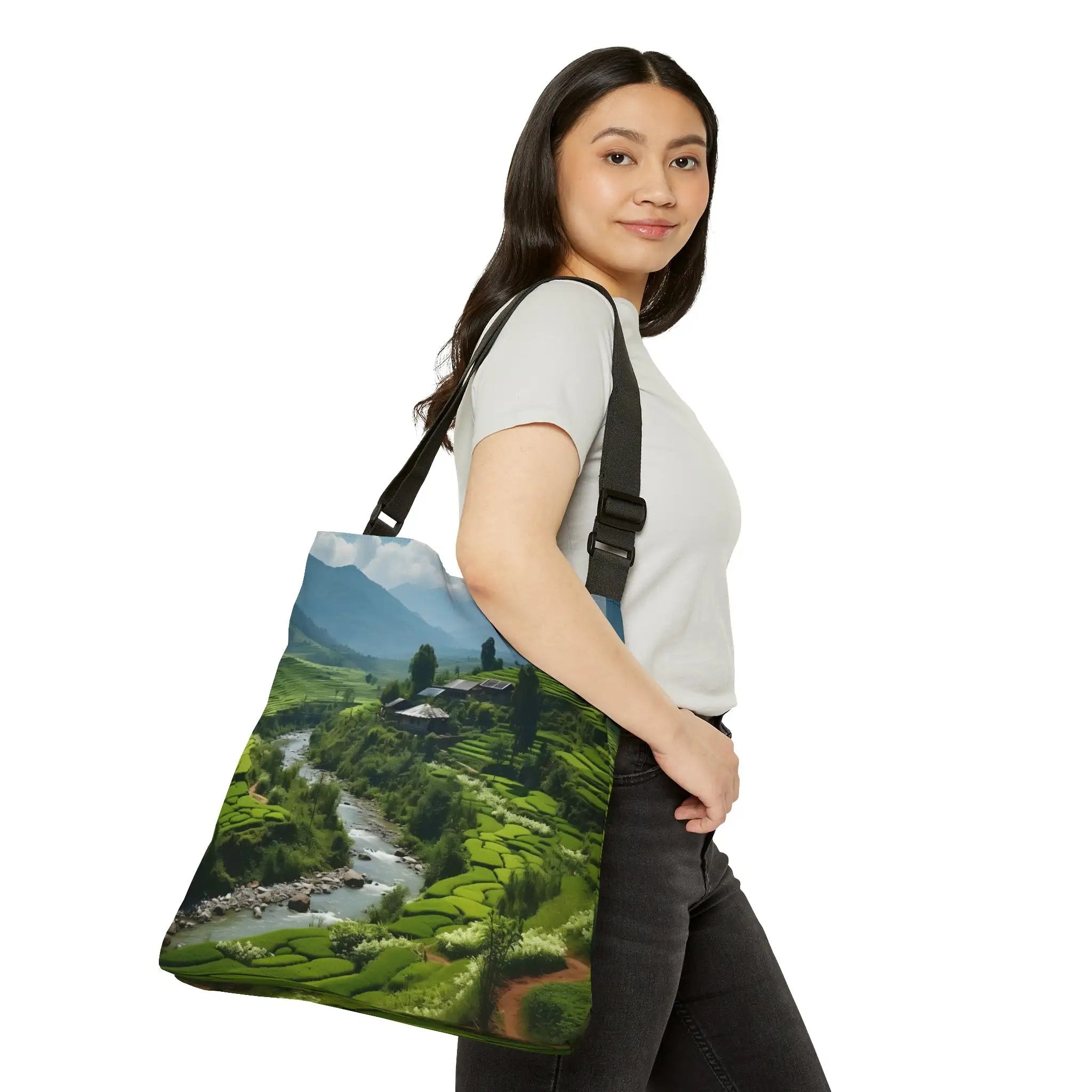 Weekender tote bag | a woman carrying a bag with a picture of a river