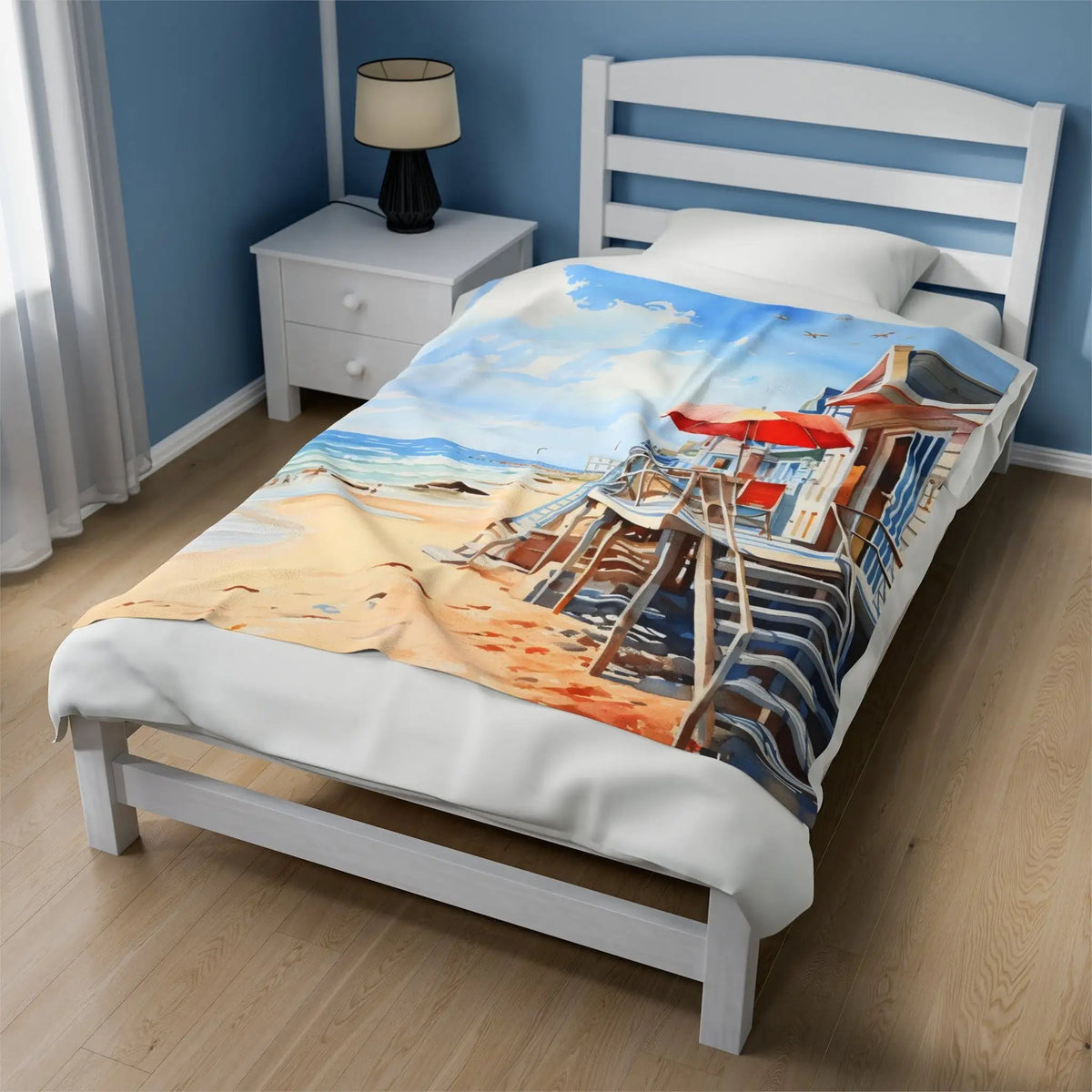 bedroom Blanket | a bed with a painting of a beach scene on it