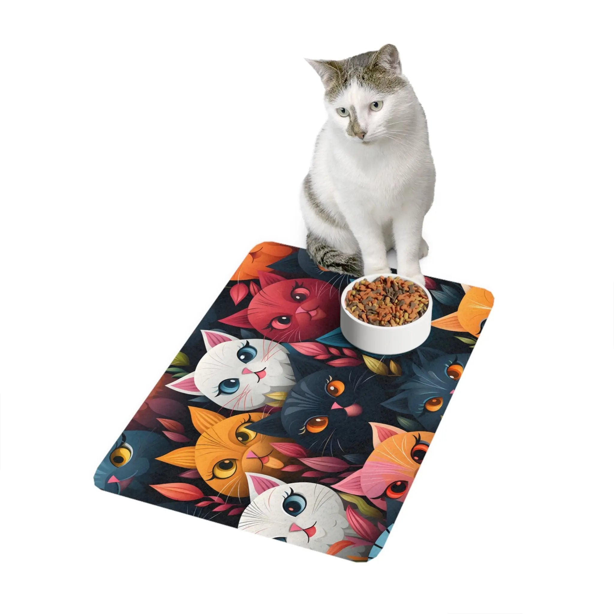 Pet Food Mat | a cat sitting on a mat with a bowl of food in front of it