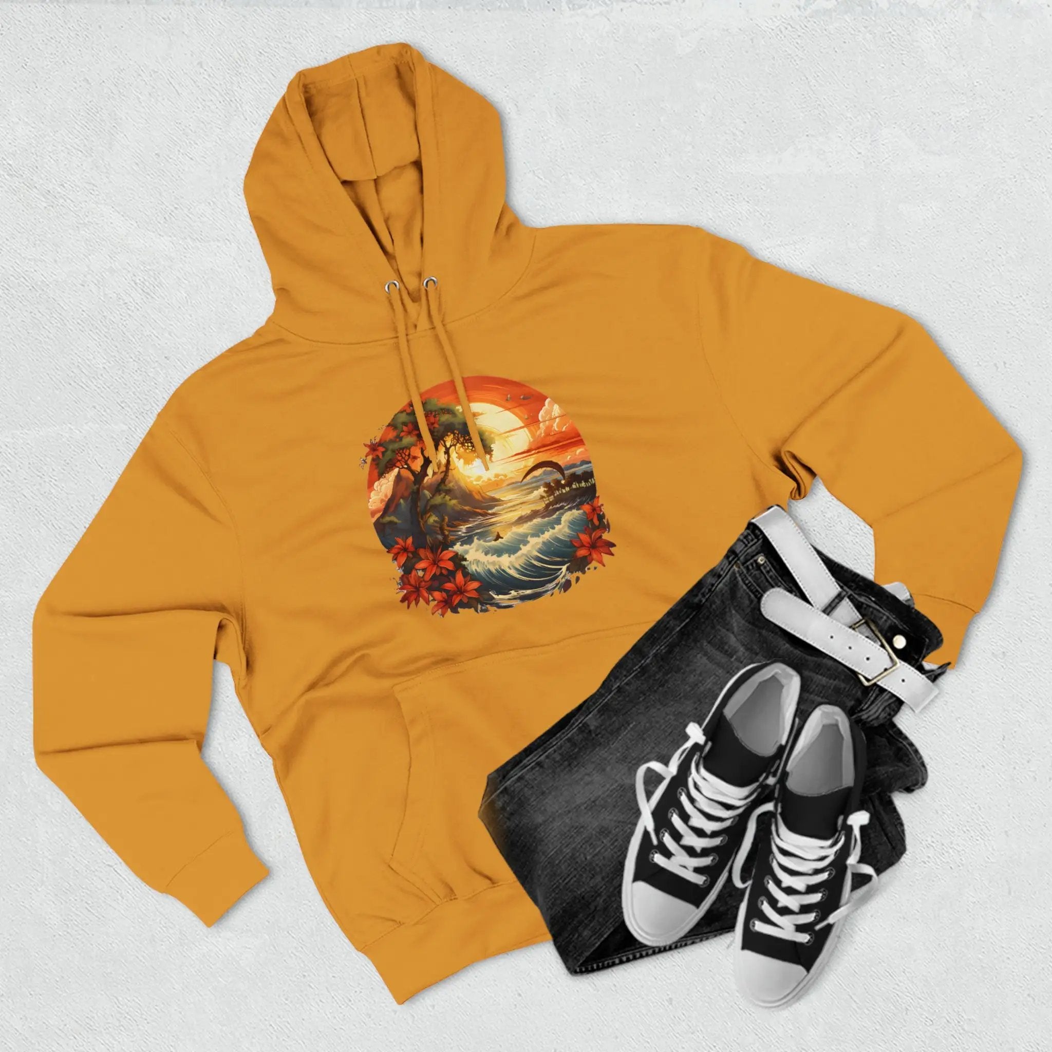 pullover hoodie | a pair of sneakers and a yellow hoodie on a white surface