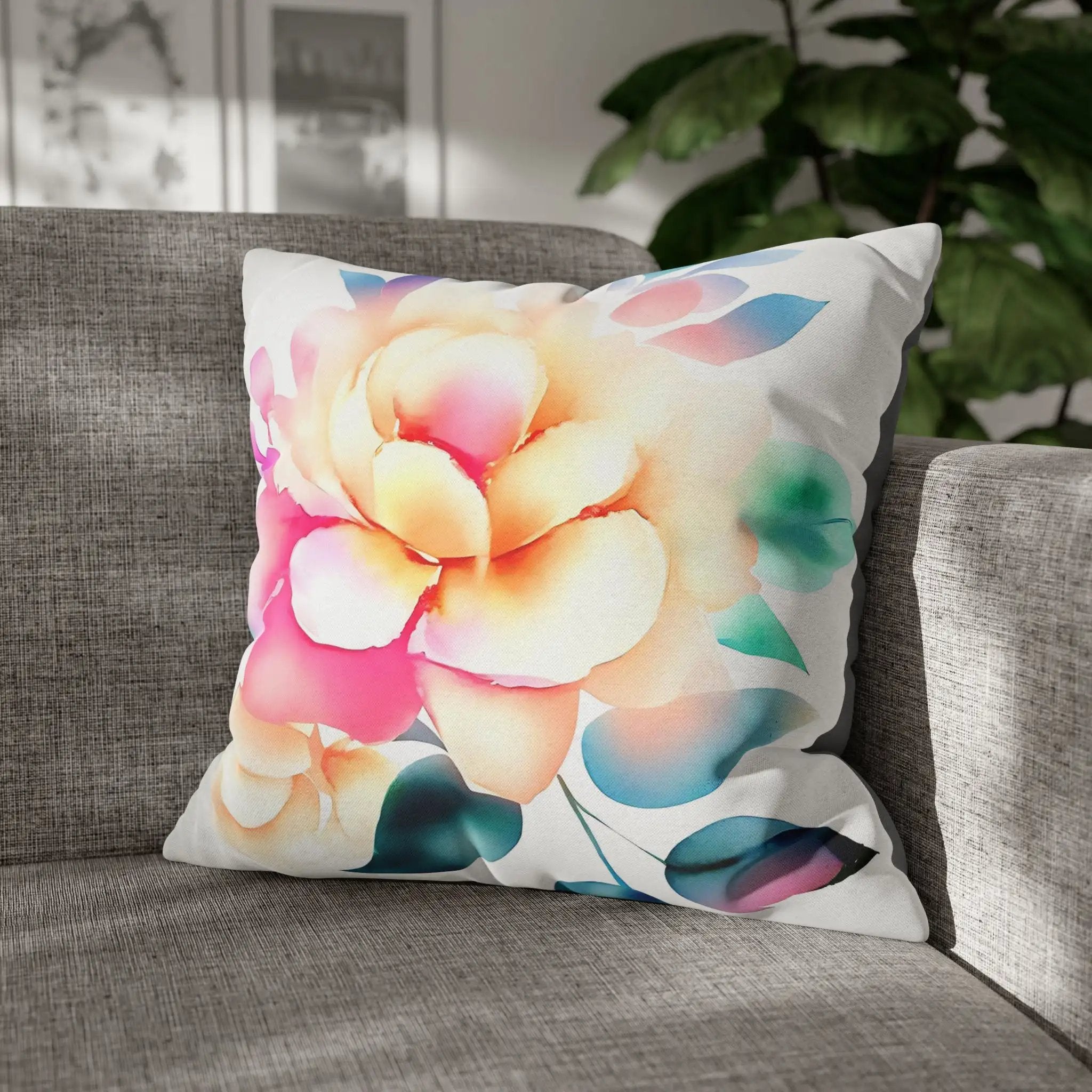 Pillow Sham | a flower pillow sitting on a couch next to a potted plant