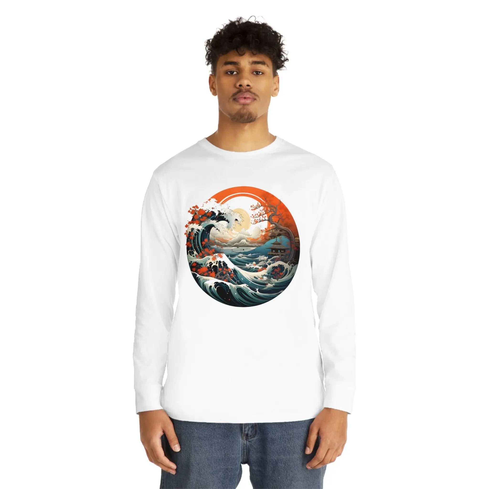 Long Sleeve t shirt | a man wearing a white long sleeve shirt with a painting of a wave in the