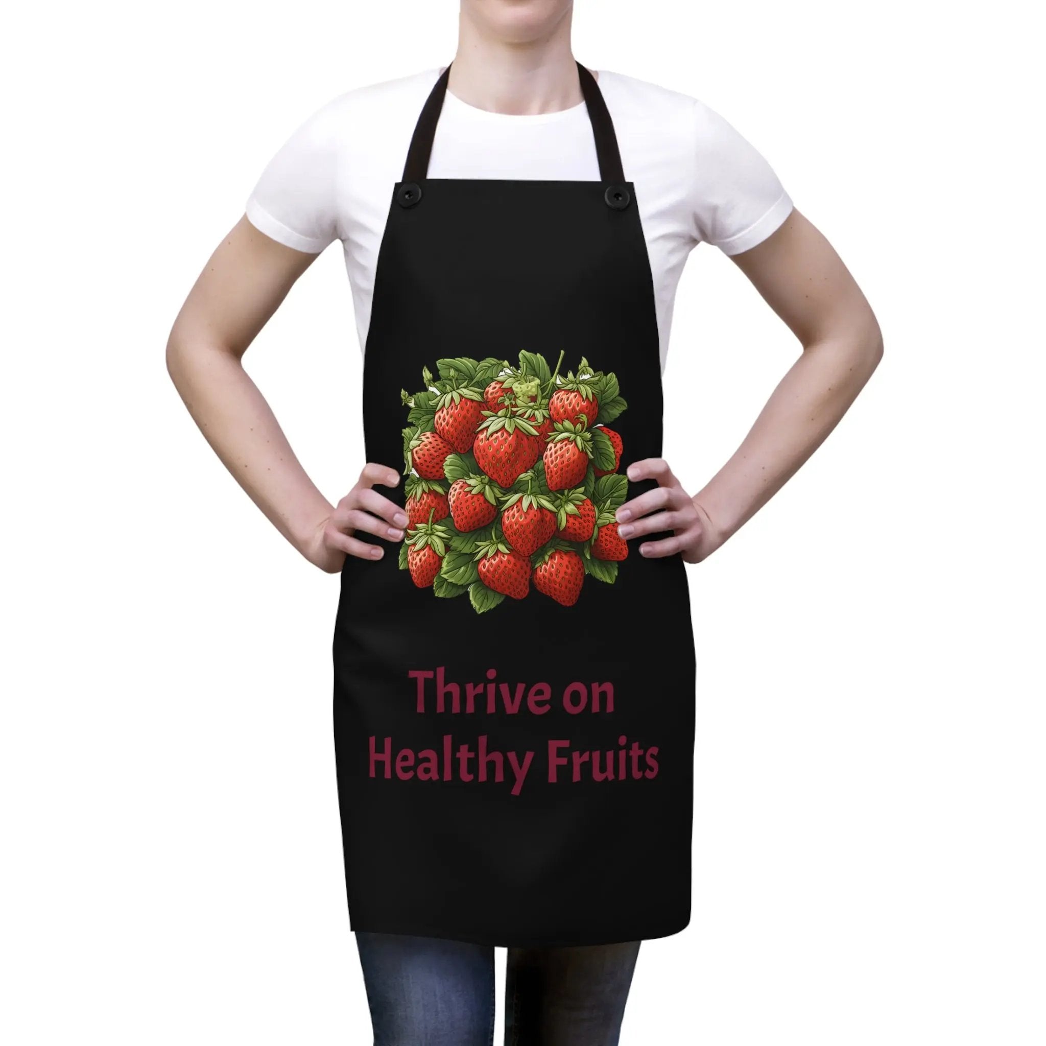 Chef Apron | a woman wearing a black apron with strawberries on it