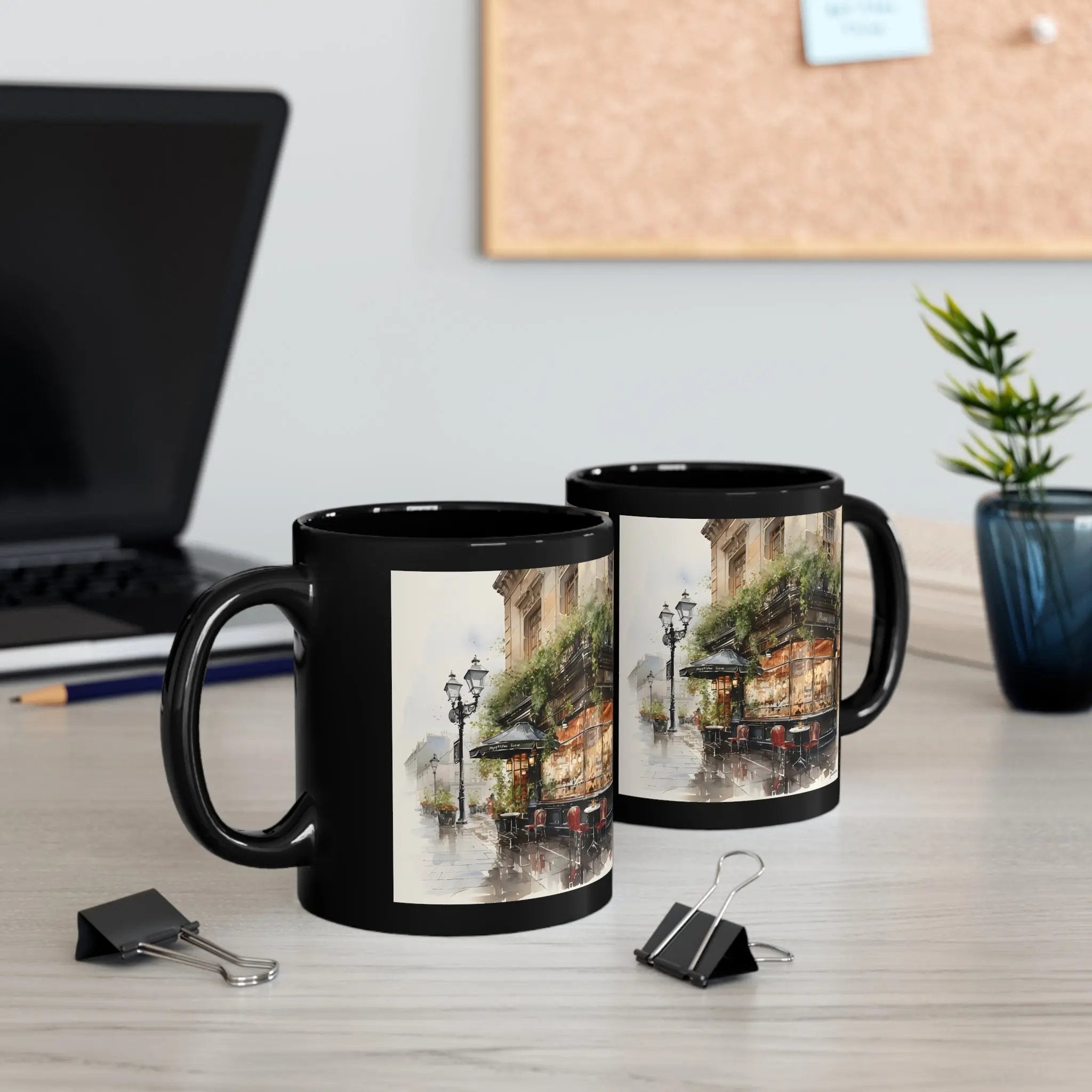 Mugs coffee | two black coffee mugs sitting on top of a table