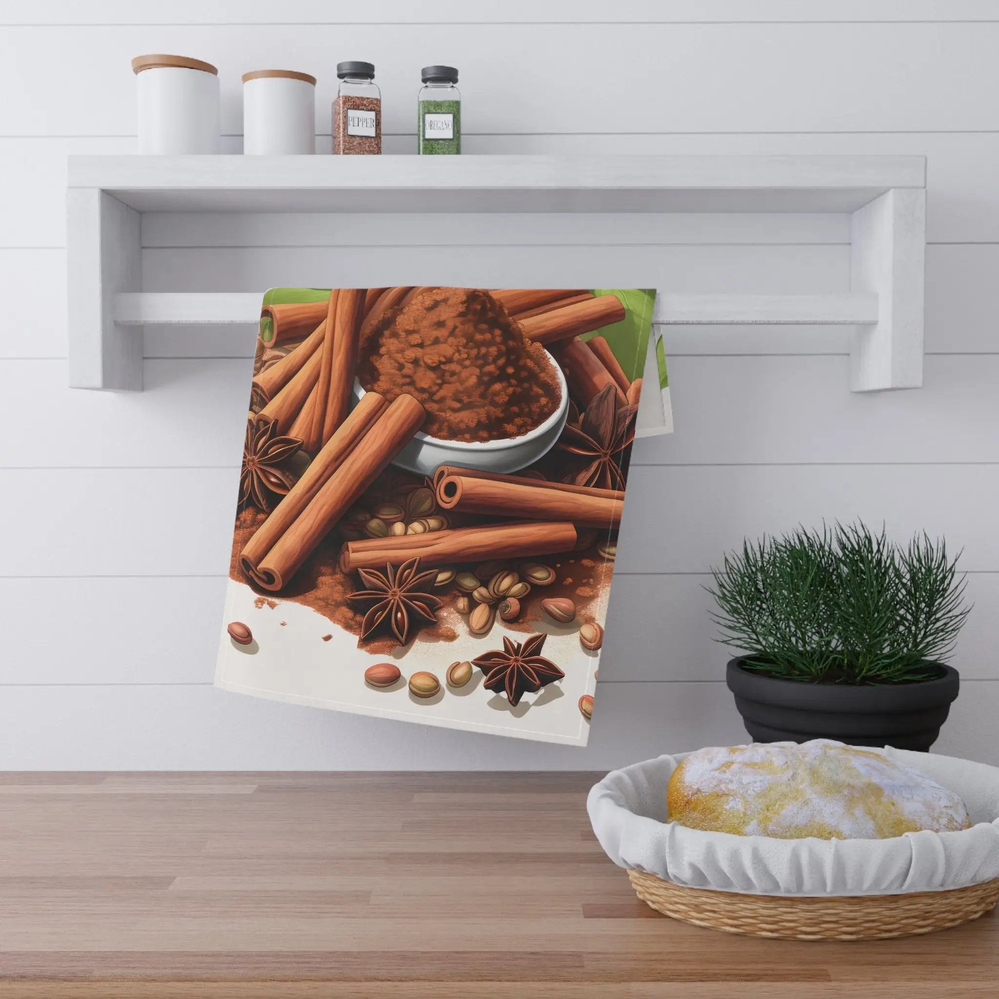 Kitchen Towel | a picture of cinnamons and spices hanging on a wall