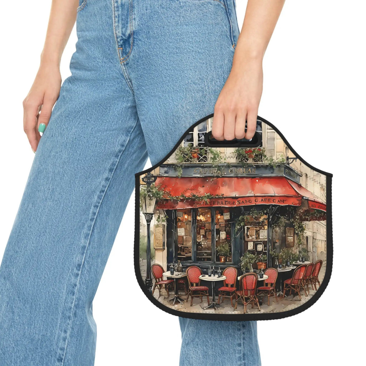 Insulated lunch bag | a woman holding a small purse with a picture of a restaurant on it