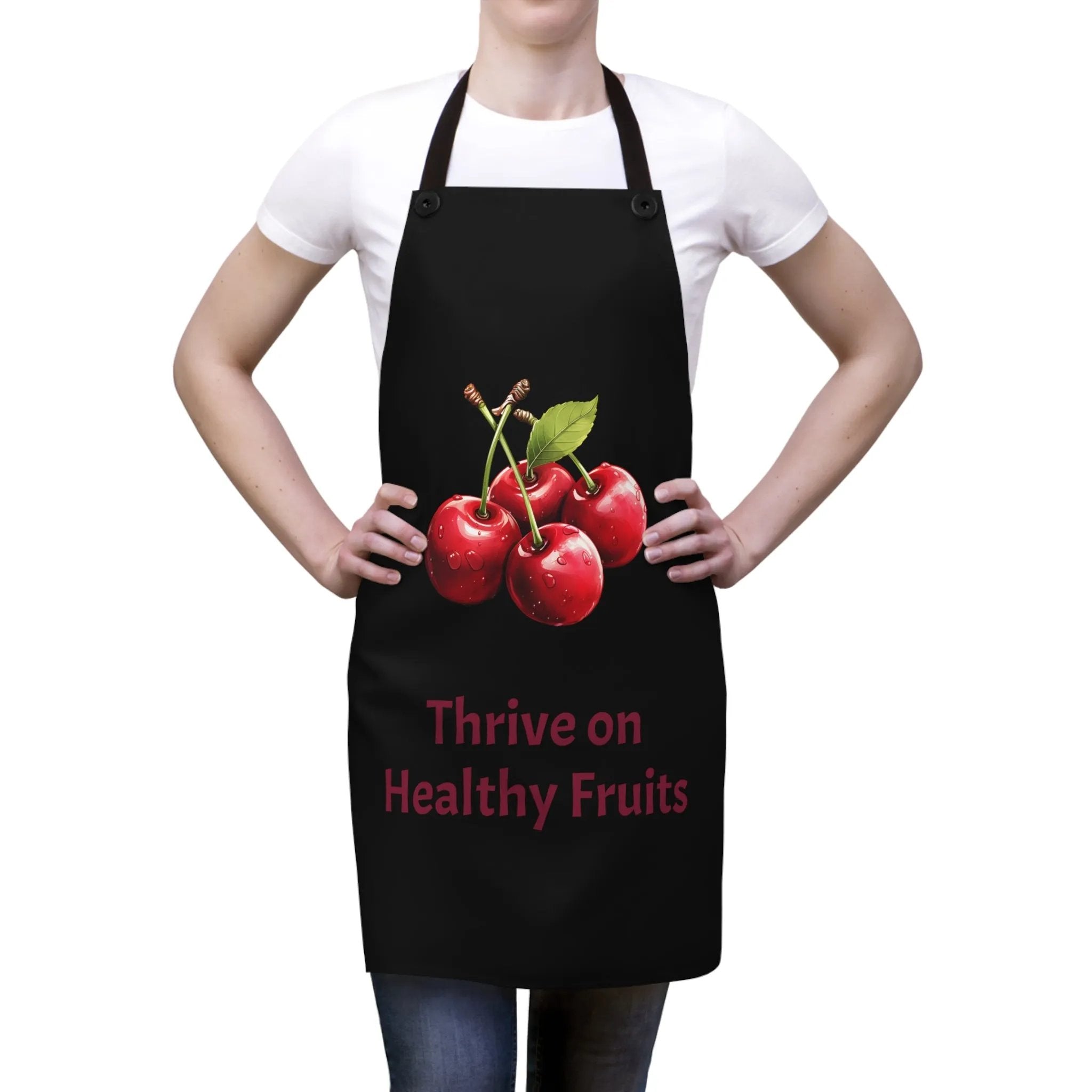 Chef Apron | a woman wearing an apron with cherries on it