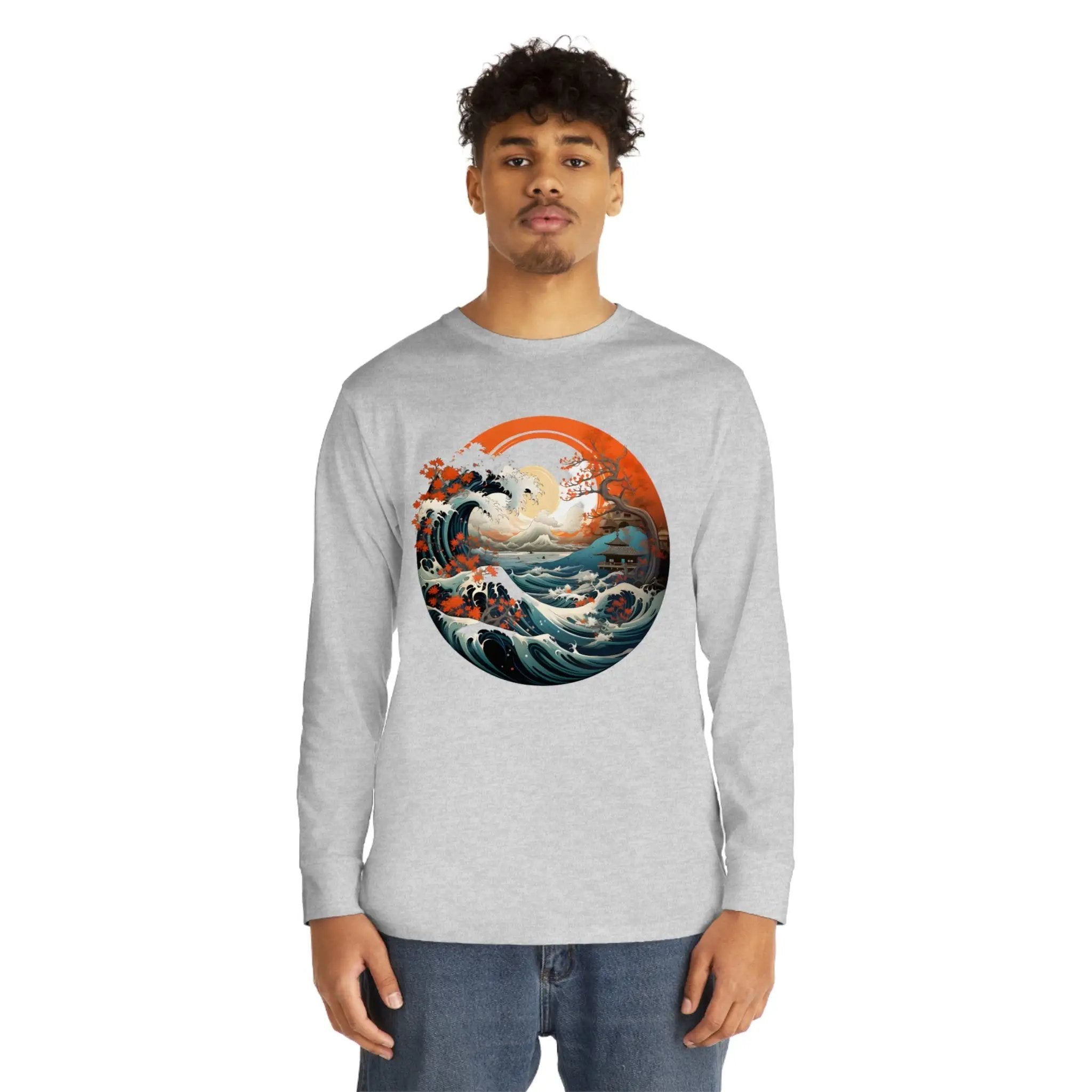 Long Sleeve t shirt | a man wearing a long sleeve shirt with an image of a wave in the ocean