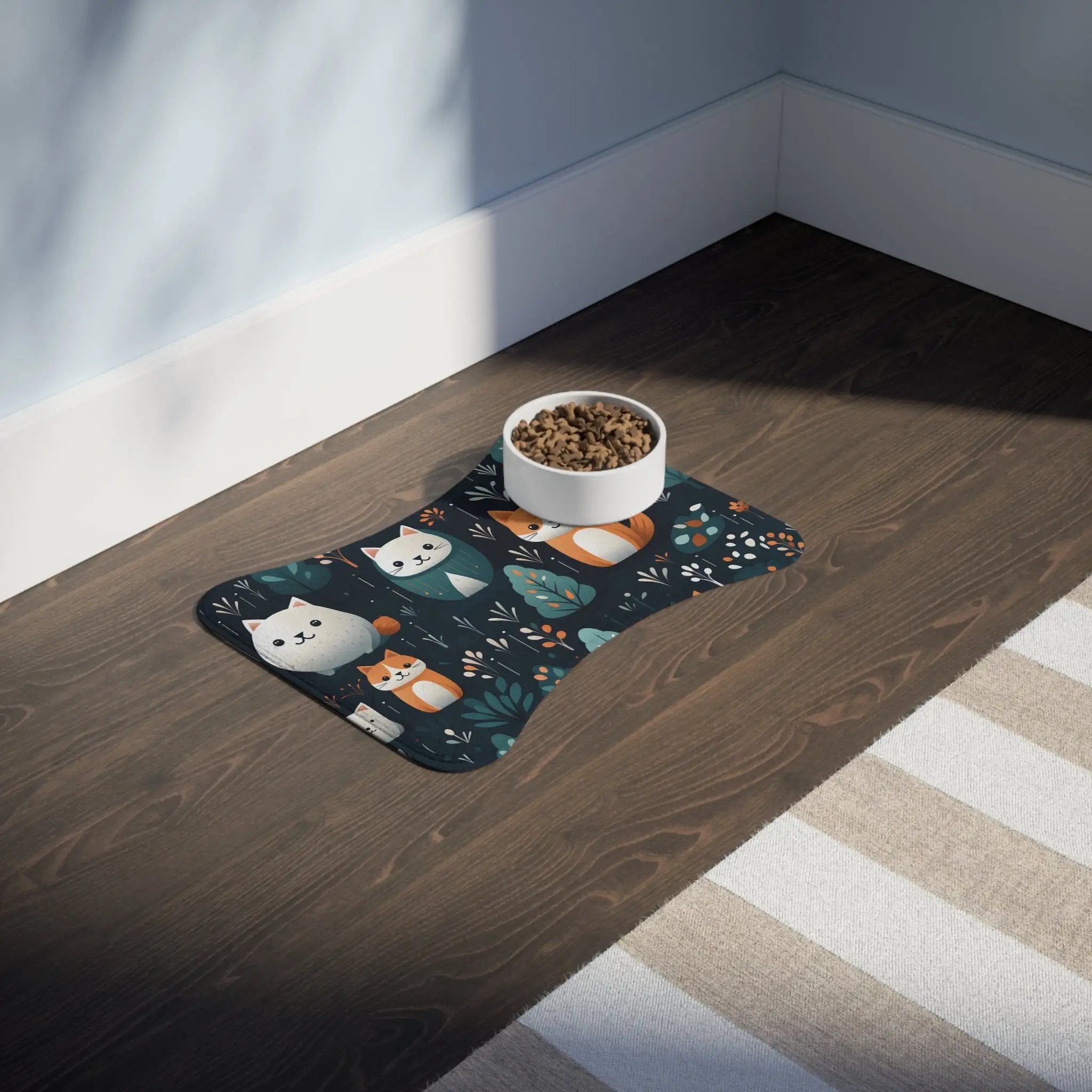 Pet Feeding Mats | a bowl of food sitting on top of a wooden floor