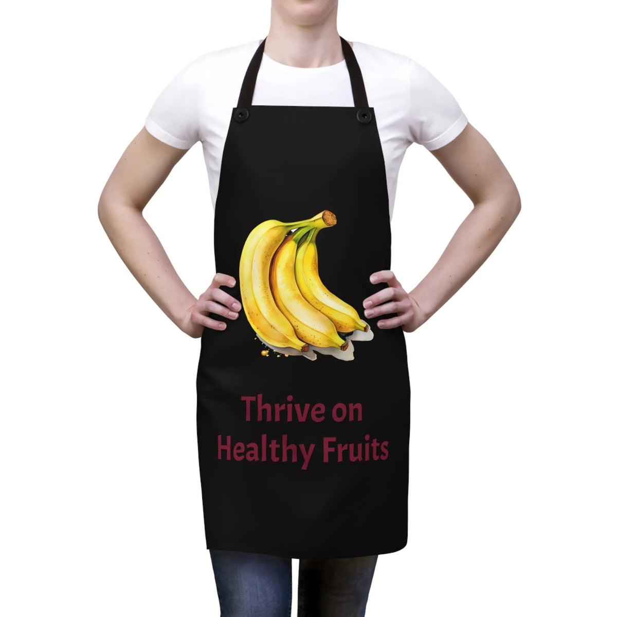 Chef Apron | a woman wearing a black apron with bananas on it