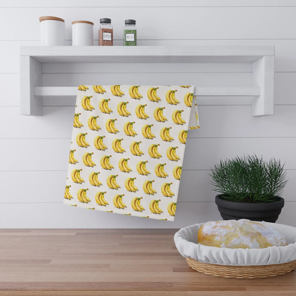 Kitchen Towel | a yellow banana pattern on a white background