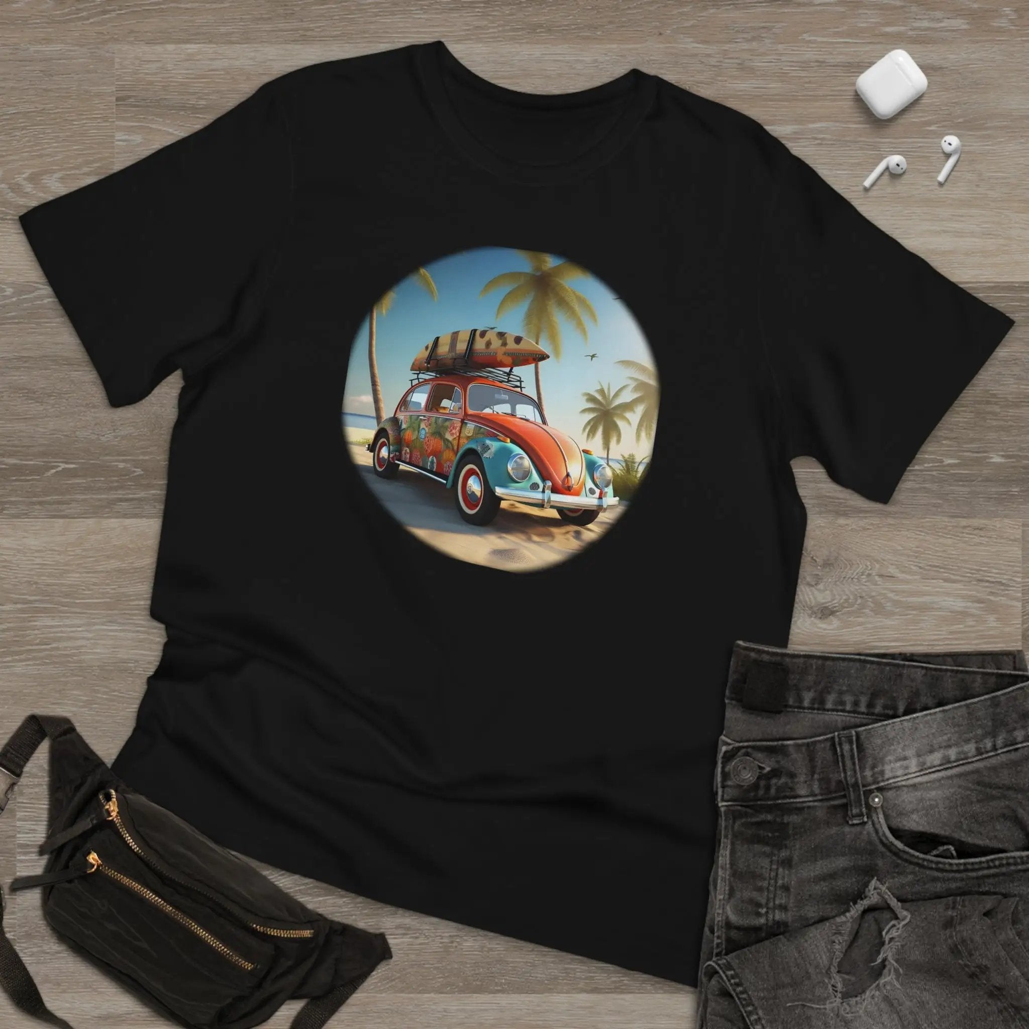 graphic men shirt | a black t - shirt with a picture of a car with a surfboard on