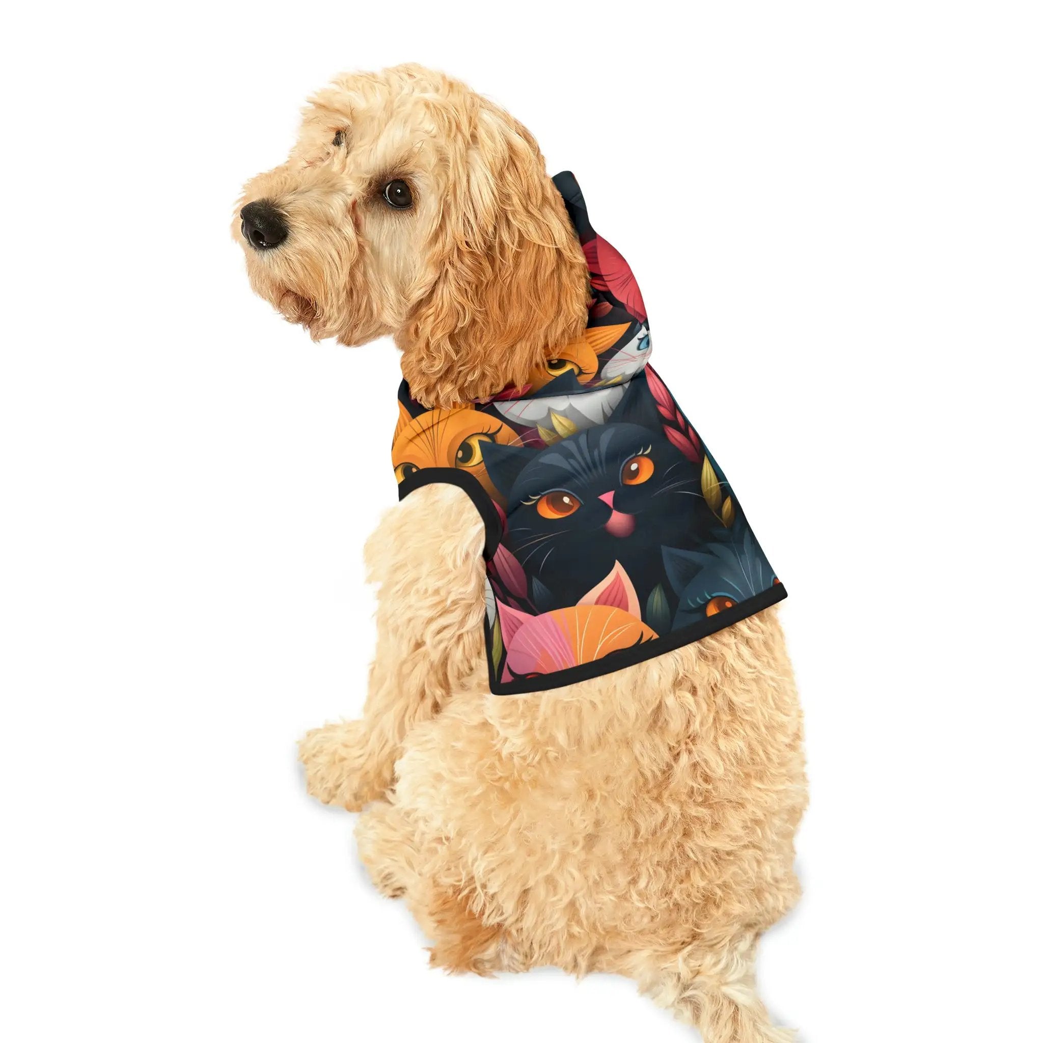 Pet hoodie | a dog wearing a vest with cats on it