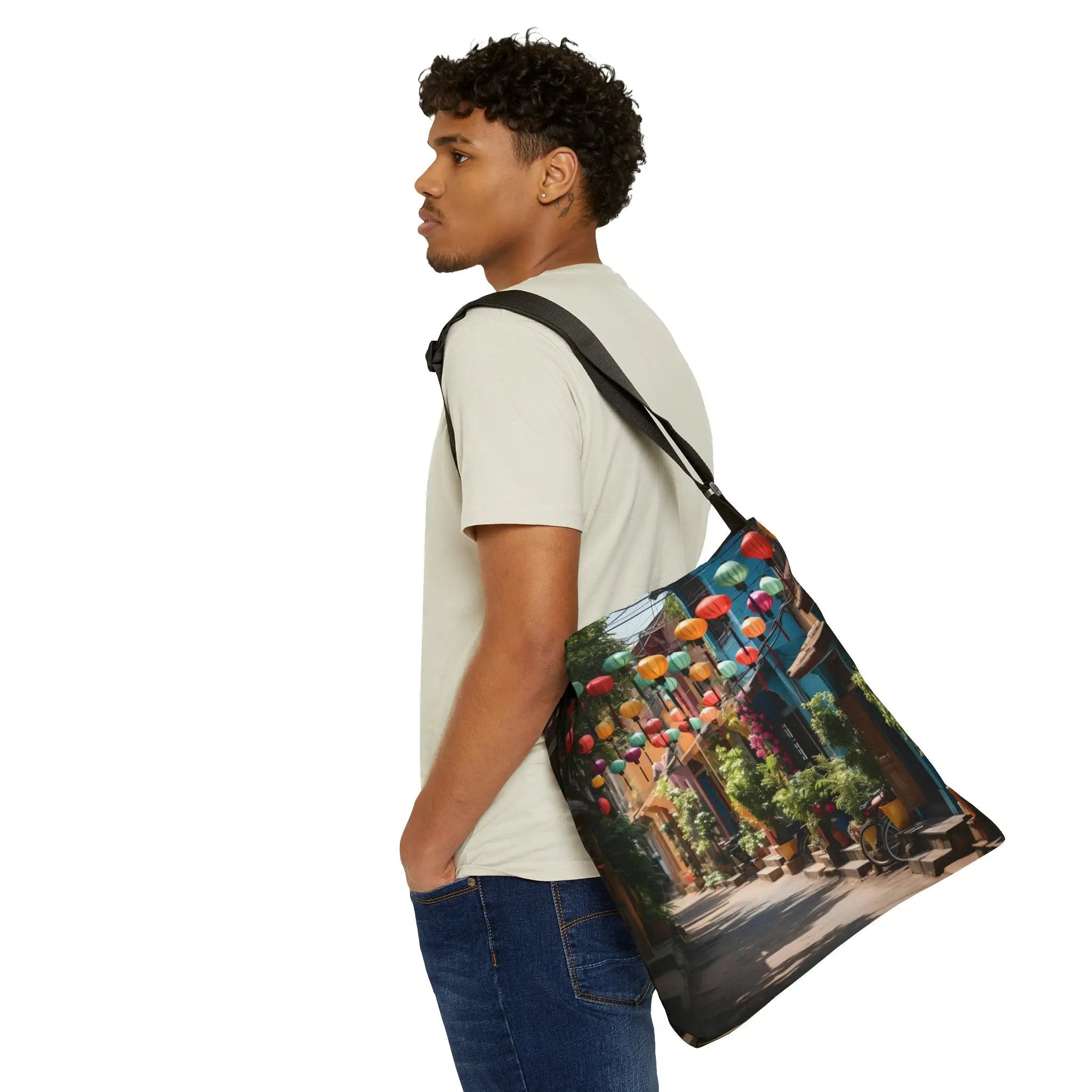 Weekender tote bag | a man carrying a bag with a picture on it