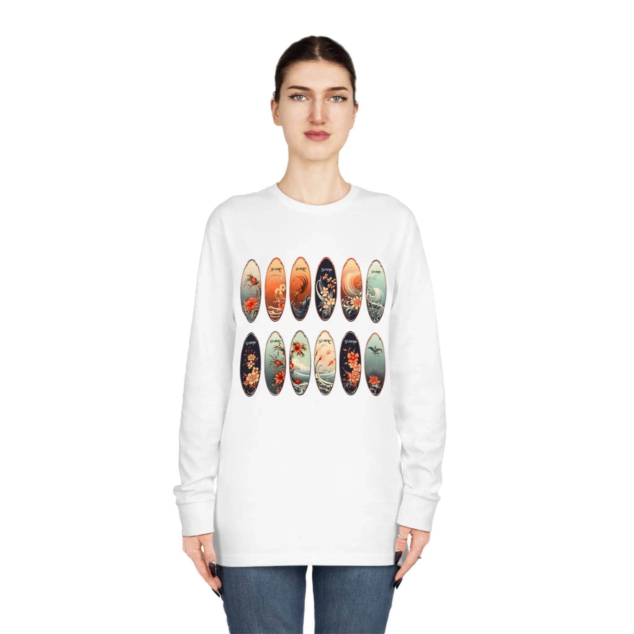 Long Sleeve t shirt | a woman wearing a white sweatshirt with a picture of surfboards on it