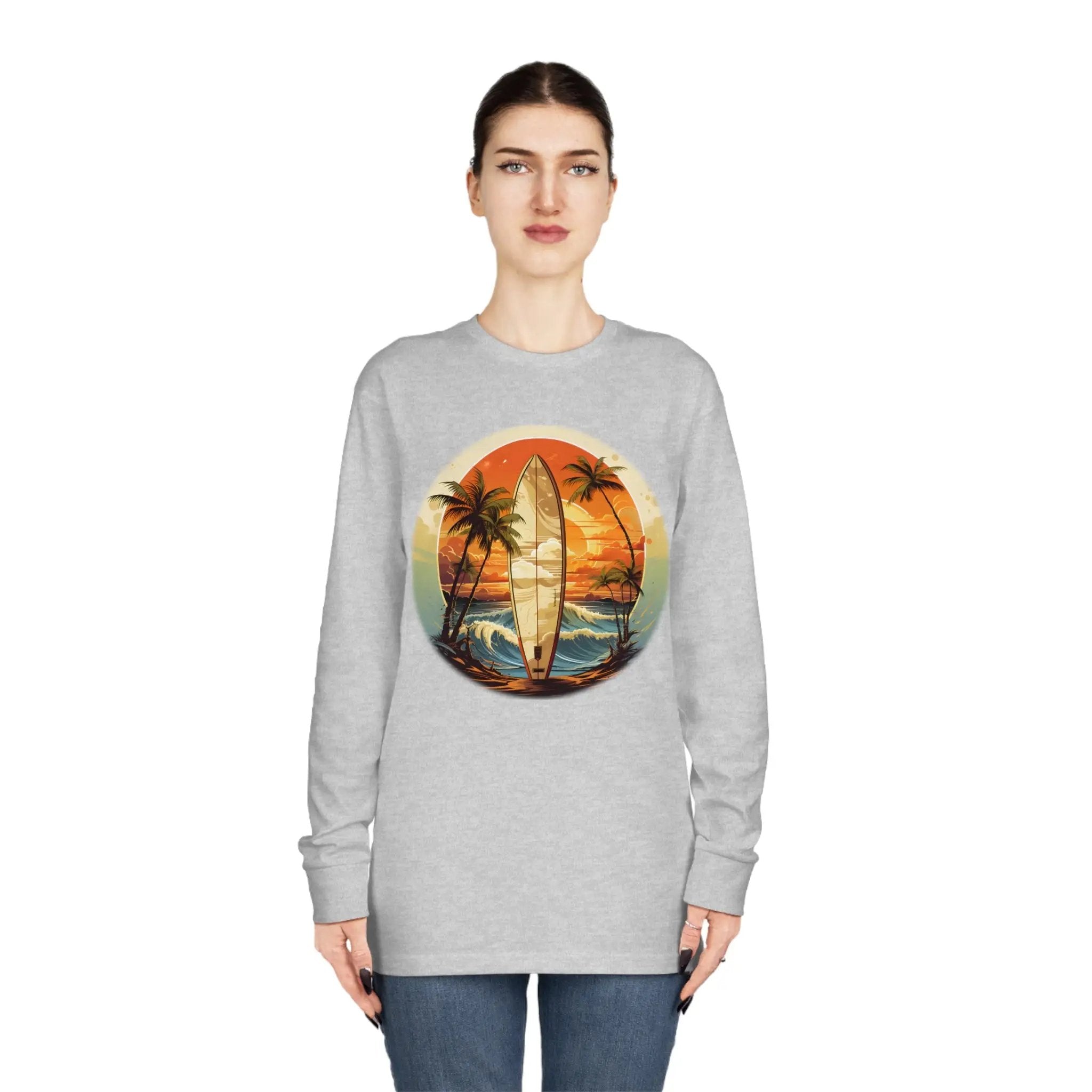 Long Sleeve t shirt | a woman wearing a sweatshirt with a surfboard on it