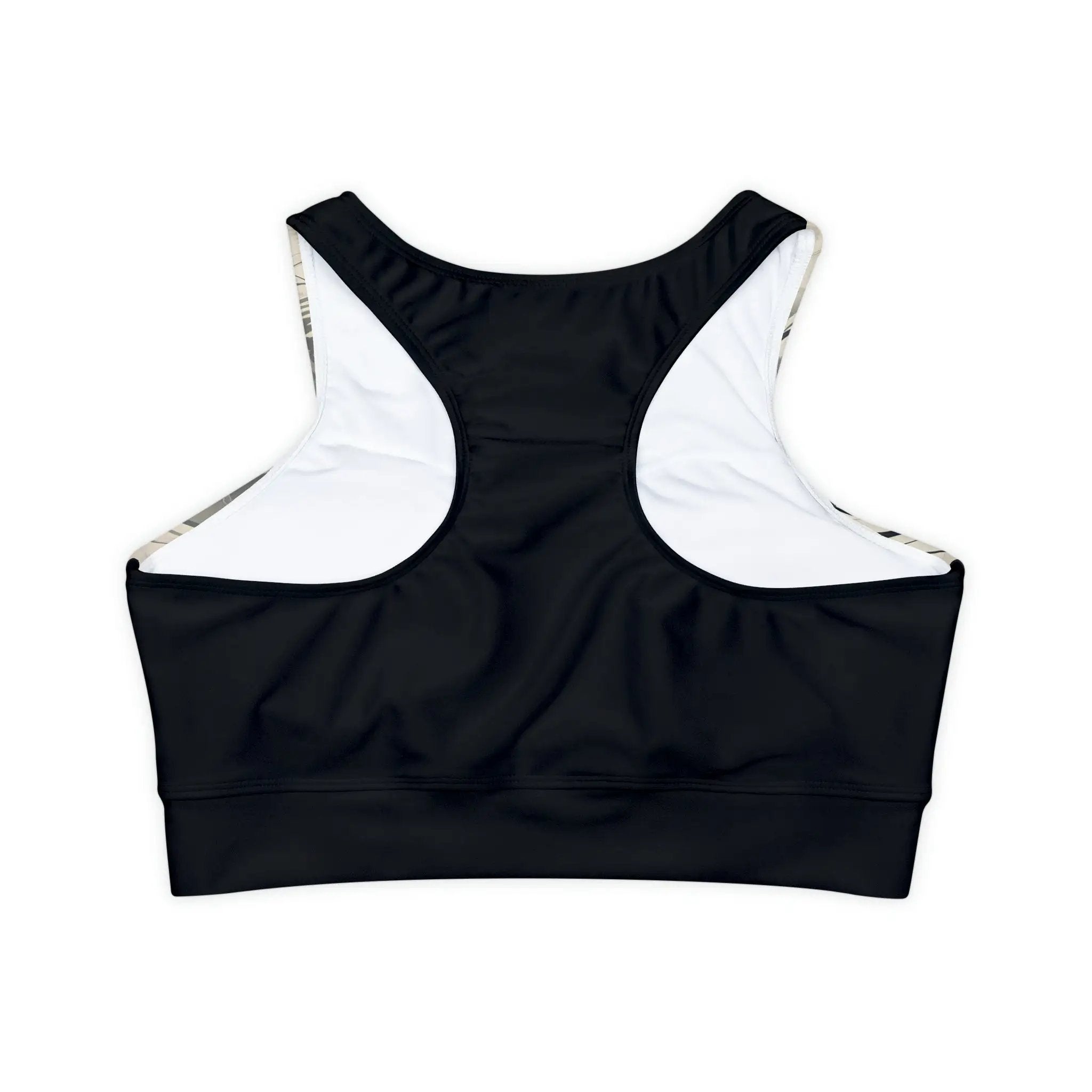 woman sports bra | a black and white crop top with a white back