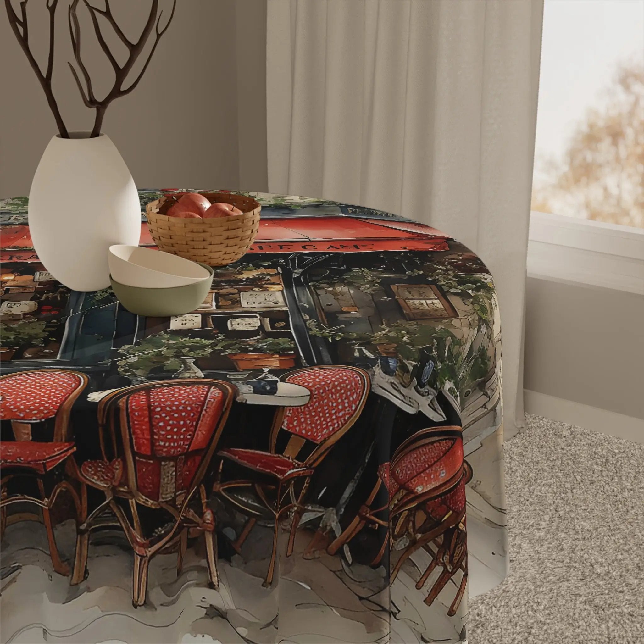 Square tablecloth | a table with a table cloth with a picture of a house and a bowl of