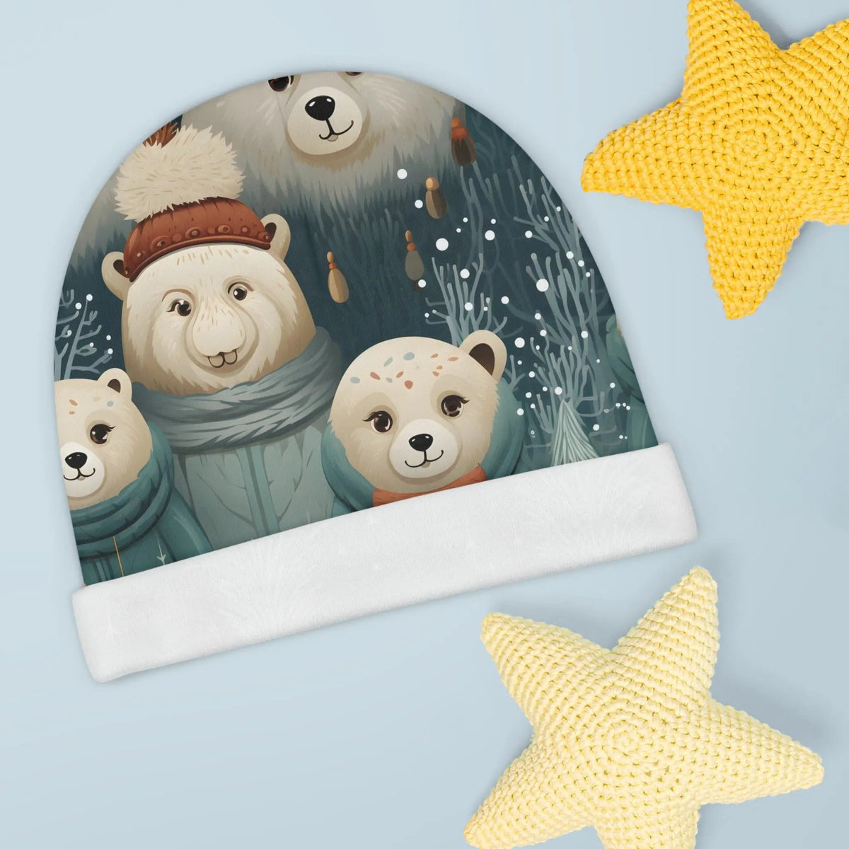 Baby Beanie | a knitted hat with three bears and a star on a blue background