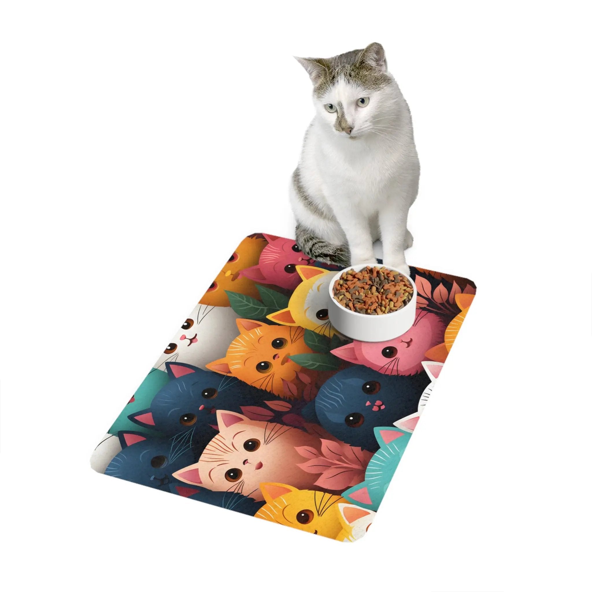 Pet Food Mat | a cat sitting on a mat with a bowl of food in front of it