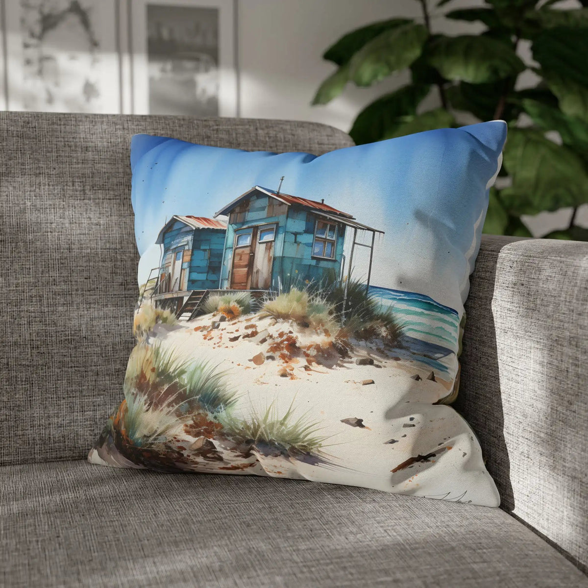 Pillow Sham | a couch with a pillow with a picture of a house on it