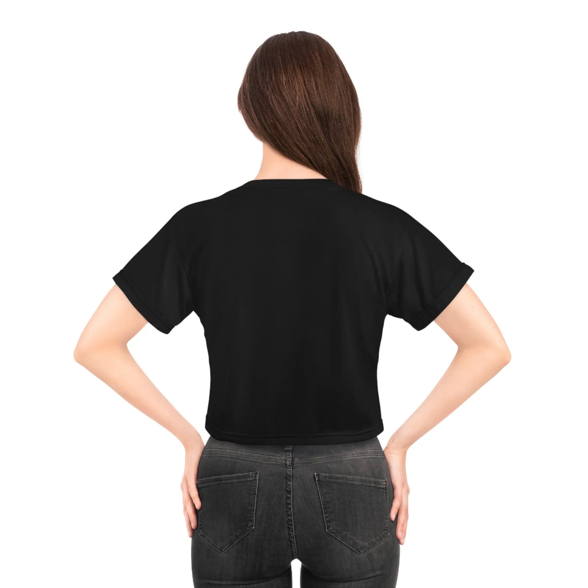 Crop shirts for women | a woman wearing a black shirt and jeans