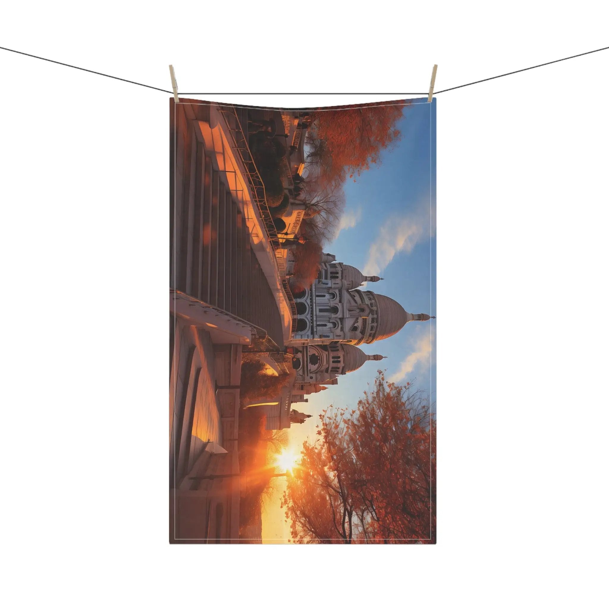 Kitchen Towel | a picture of a building with the sun setting behind it