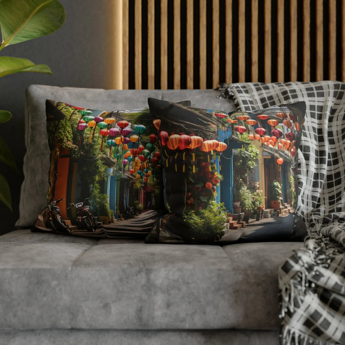 a couch with two decorative pillows on top of it